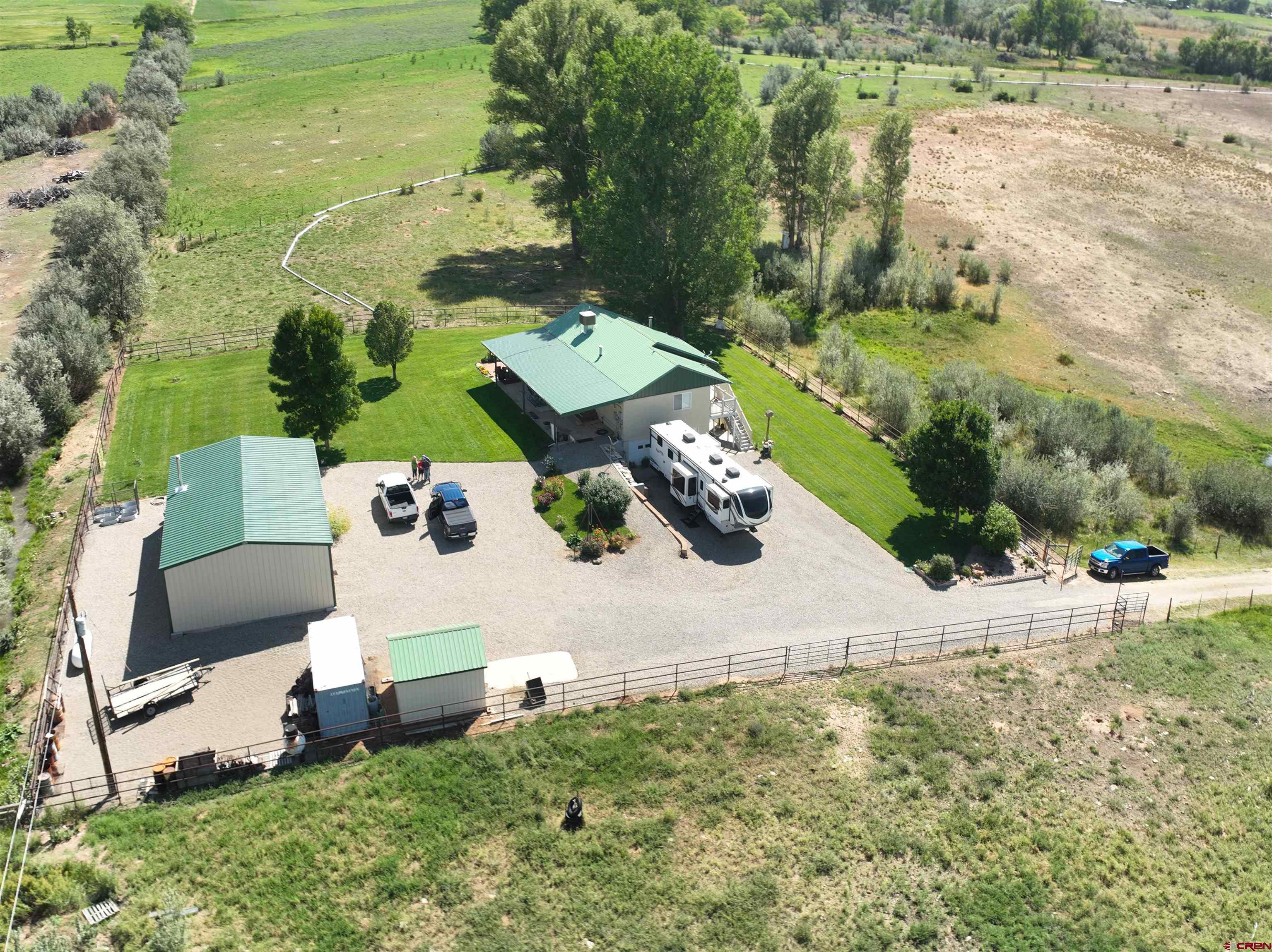 29669 DD Road Nucla, CO 81424 - Photo 4 of 33 an aerial view of a house with a yard