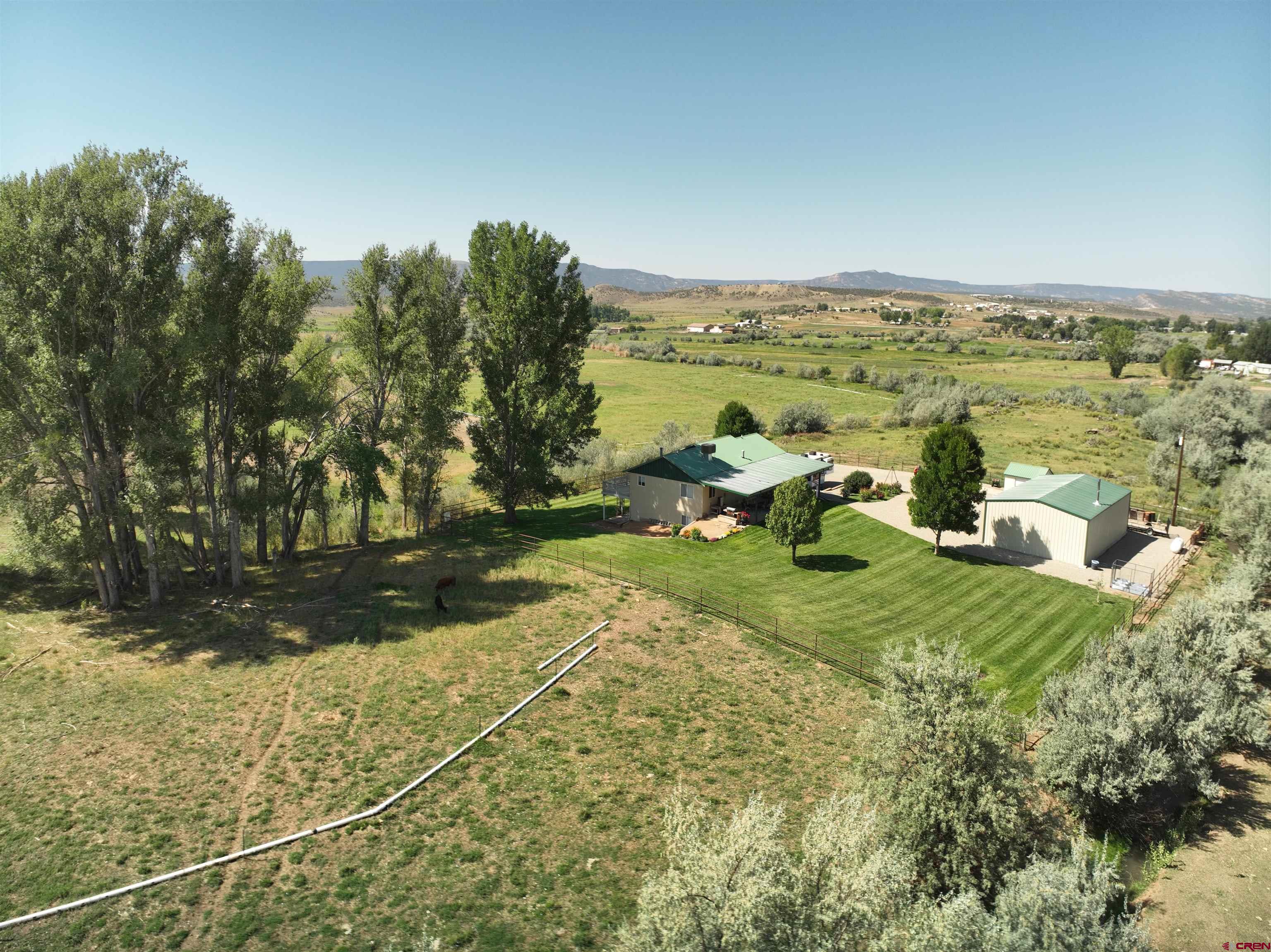 29669 DD Road Nucla, CO 81424 - Photo 5 of 33 a view of a lake with outdoor space