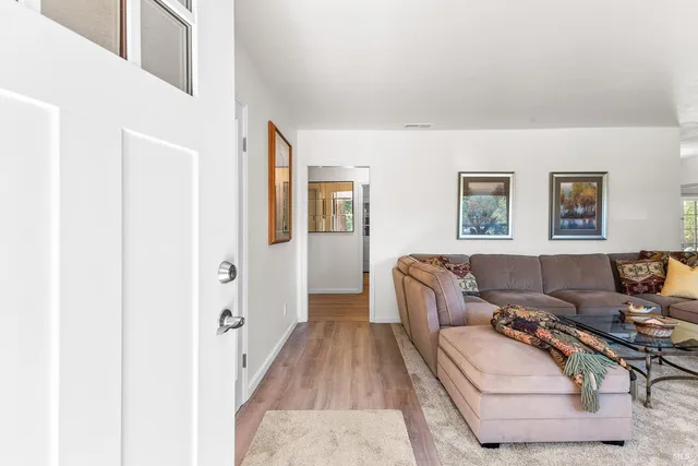 a living room with furniture and a couch