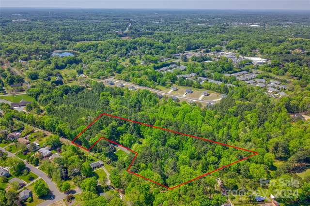an aerial view of residential house with outdoor space