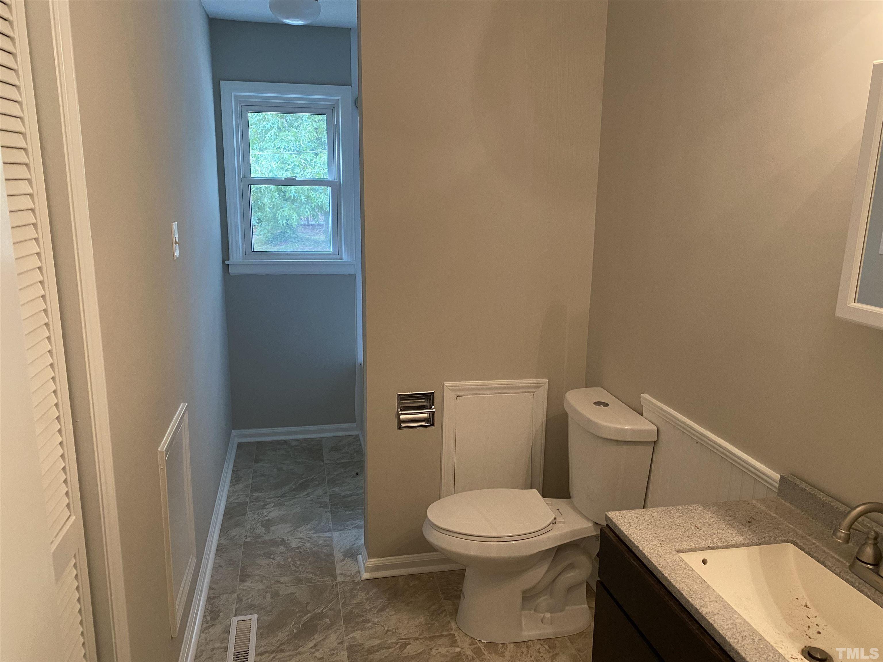 4903 Mandel Road Durham, NC 27712 - Photo 17 of 21 4th bedroom with half bath.
