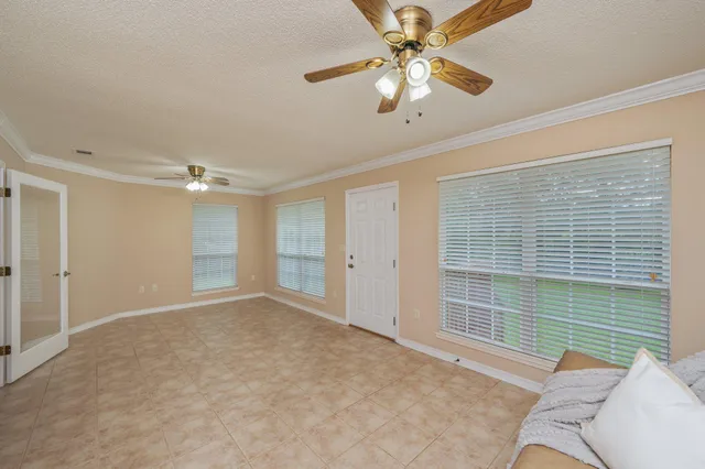 a view of a room with a fan