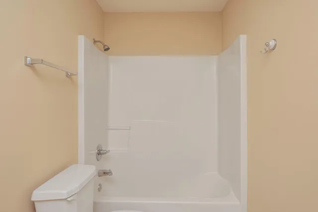 a bathroom with a sink a vanity and a mirror