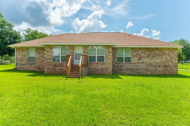 a view of a backyard with a garden