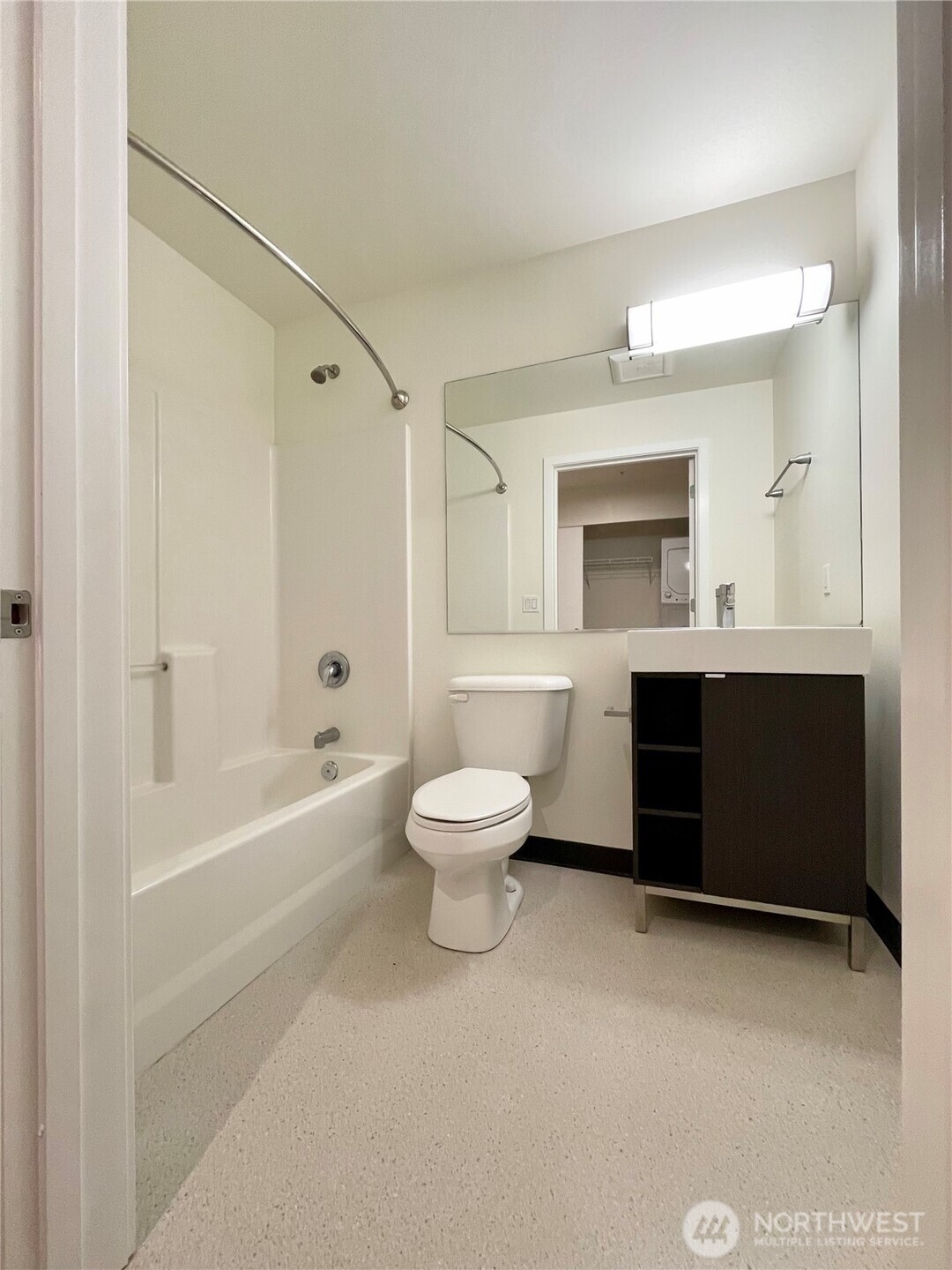 2249 Northeast 46th Street Seattle, WA 98105 - Photo 7 of 20 a bathroom with a toilet a sink and a bathtub