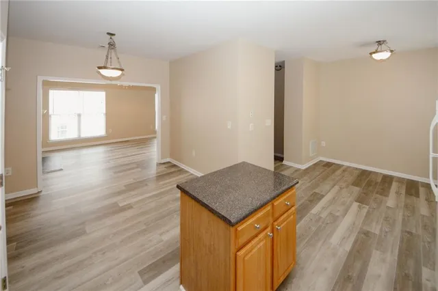 a view of a balcony with furniture