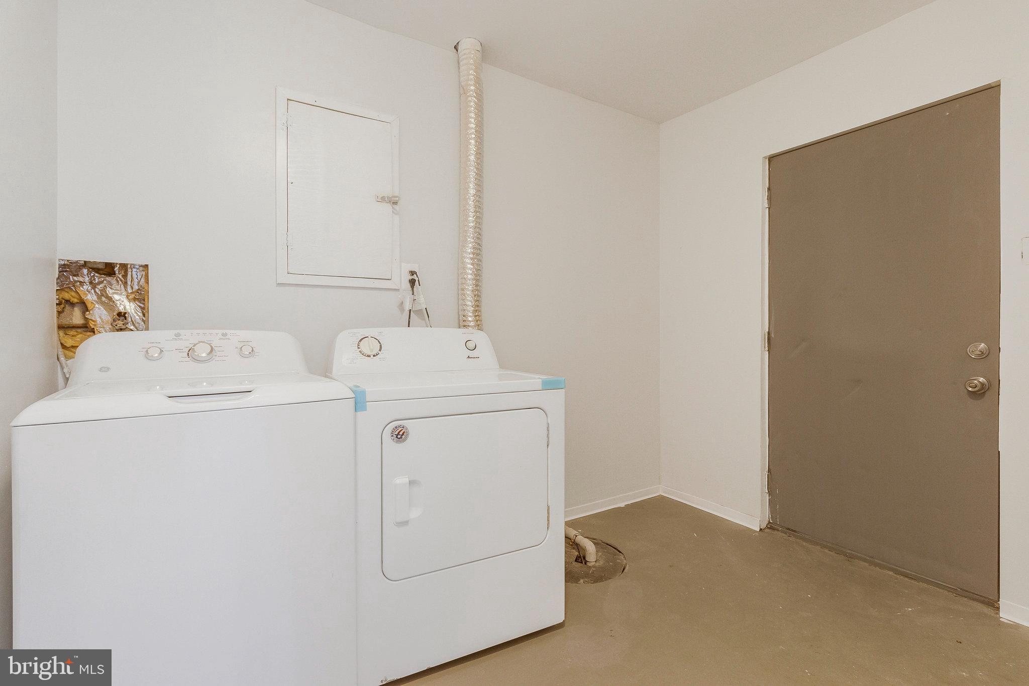 5004 Roanoke Place College Park, MD 20740 - Photo 15 of 27 a utility room with dryer and washer