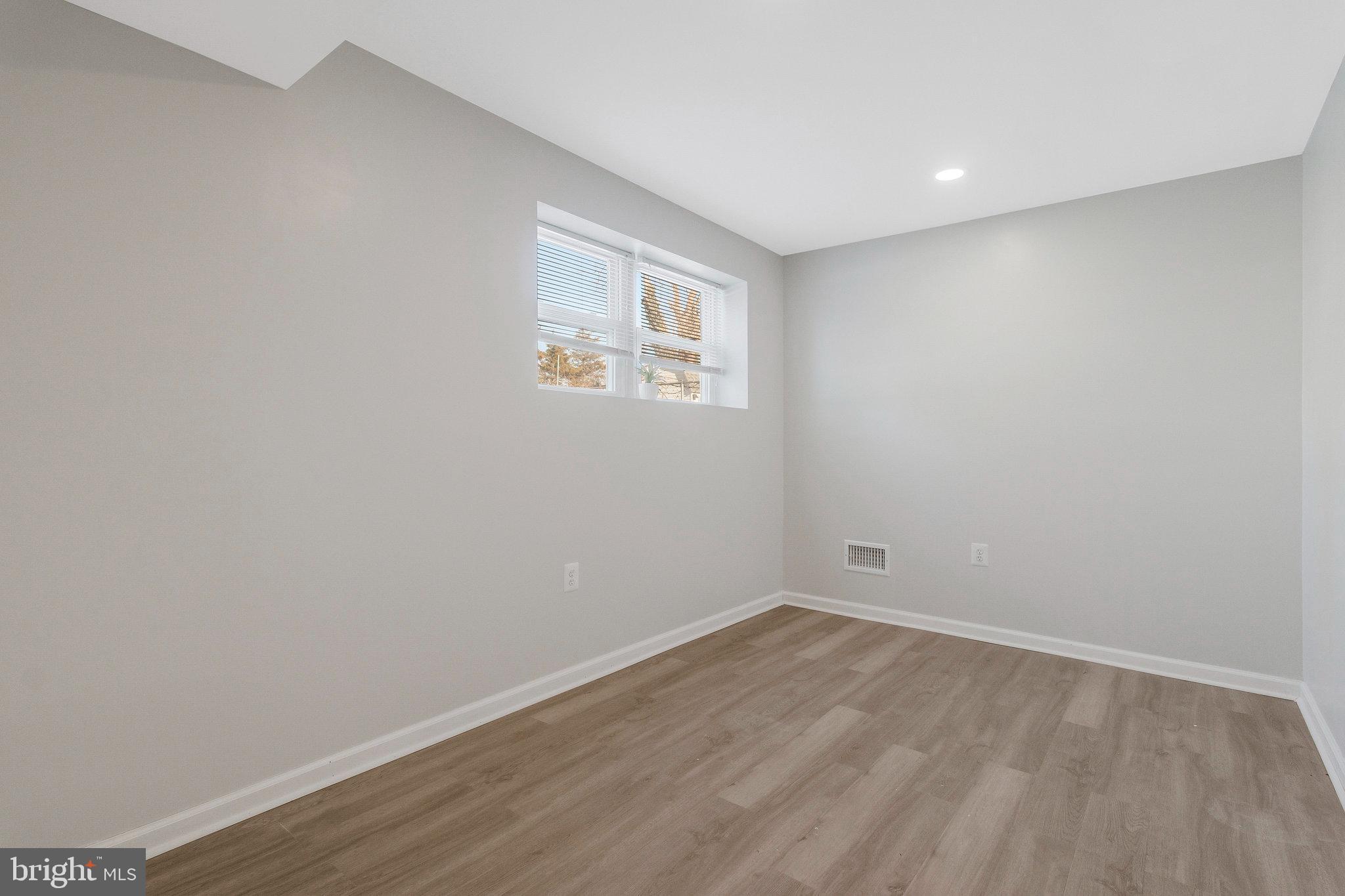 5004 Roanoke Place College Park, MD 20740 - Photo 16 of 27 wooden floor in an empty room
