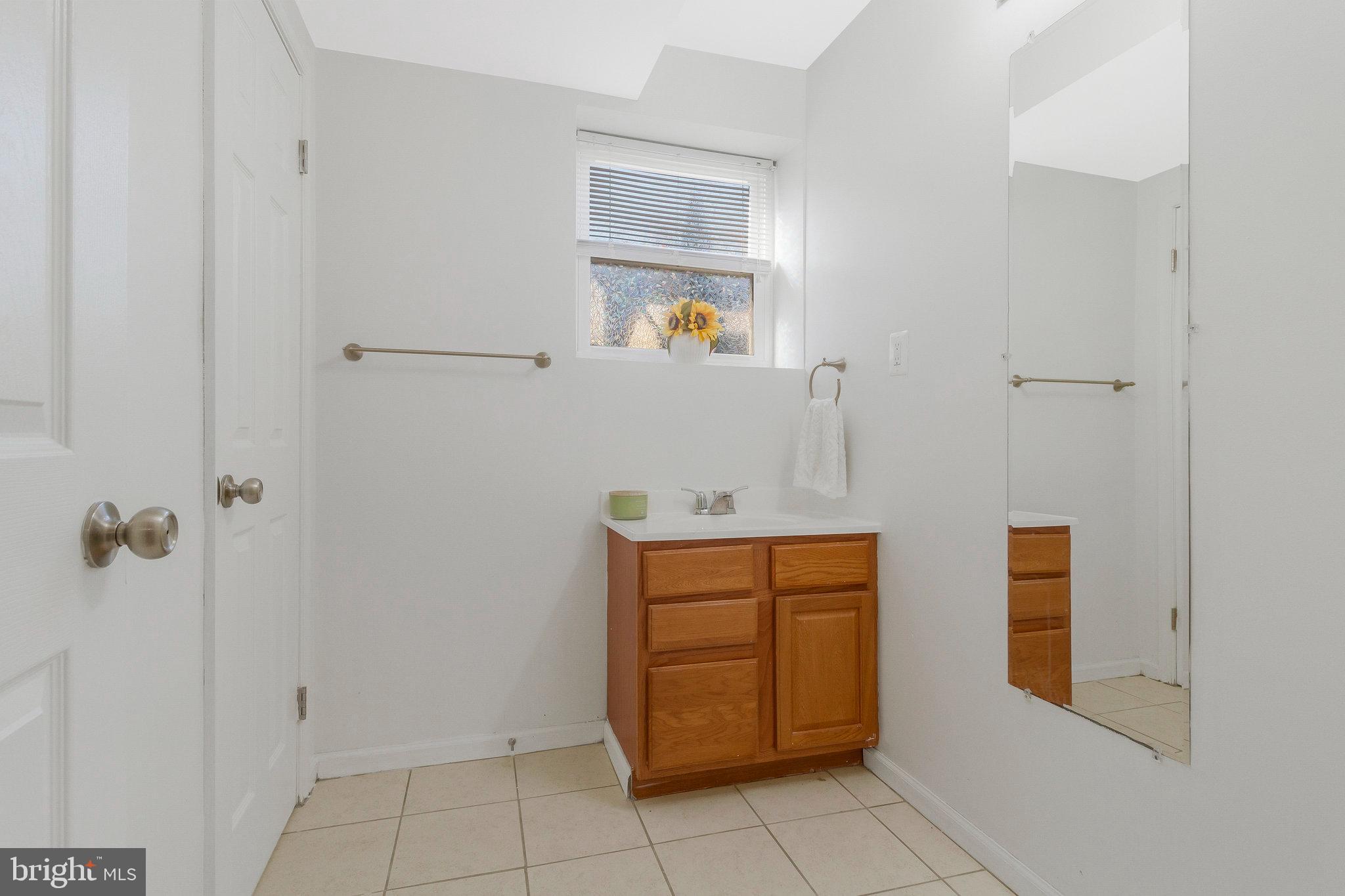 5004 Roanoke Place College Park, MD 20740 - Photo 20 of 27 a room with closet