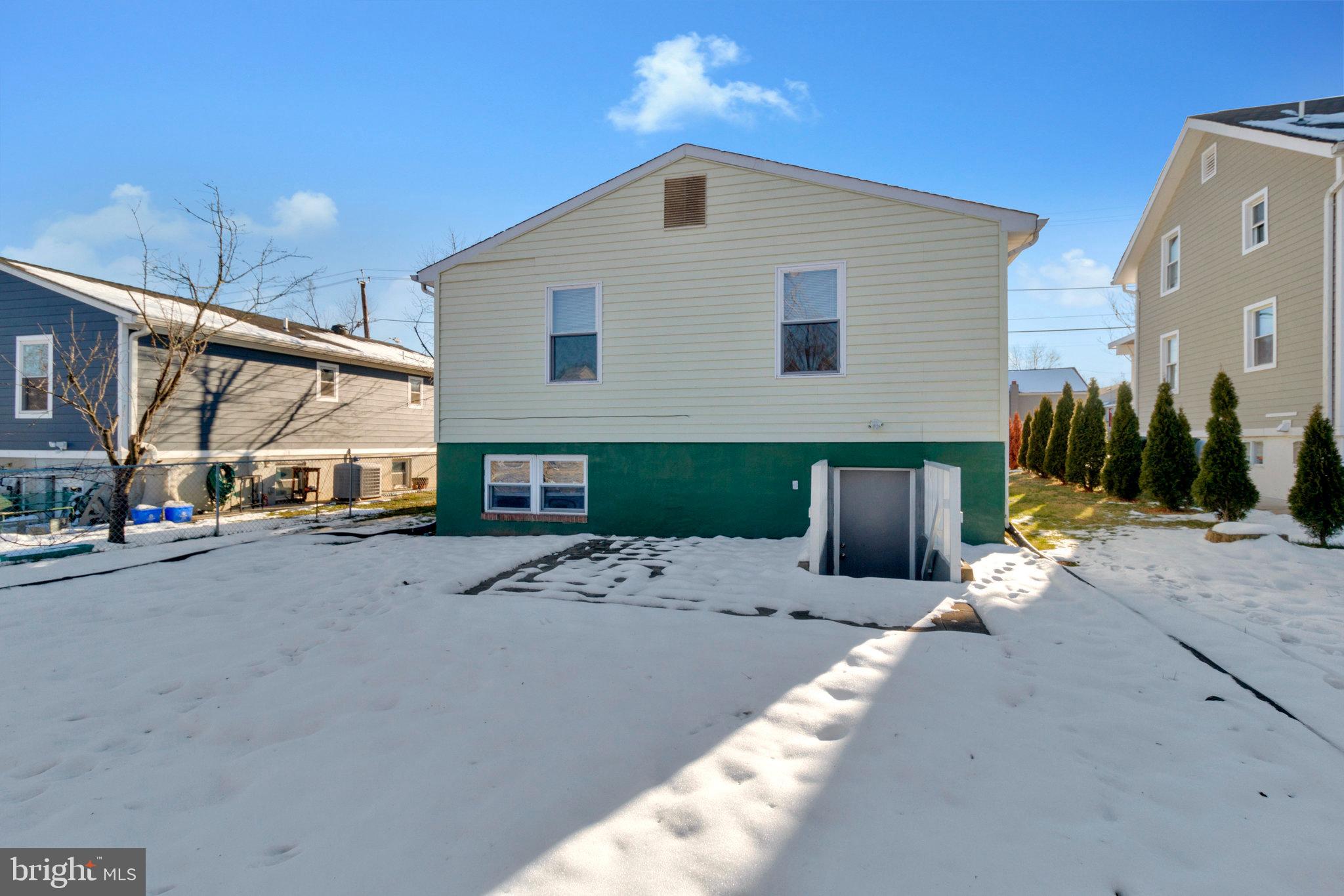 5004 Roanoke Place College Park, MD 20740 - Photo 24 of 27 a view of a house with a patio