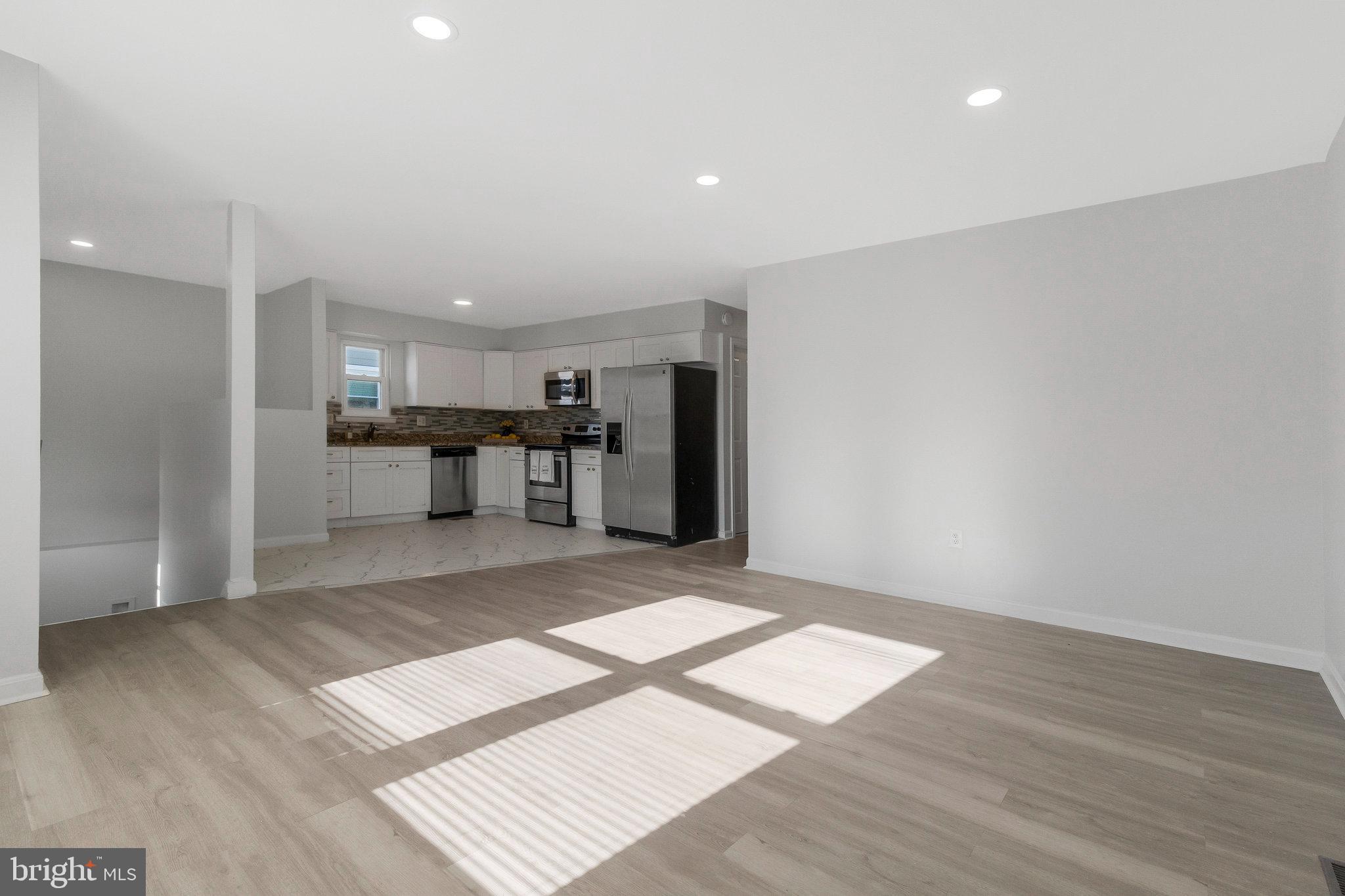 5004 Roanoke Place College Park, MD 20740 - Photo 3 of 27 a view of kitchen with refrigerator and window