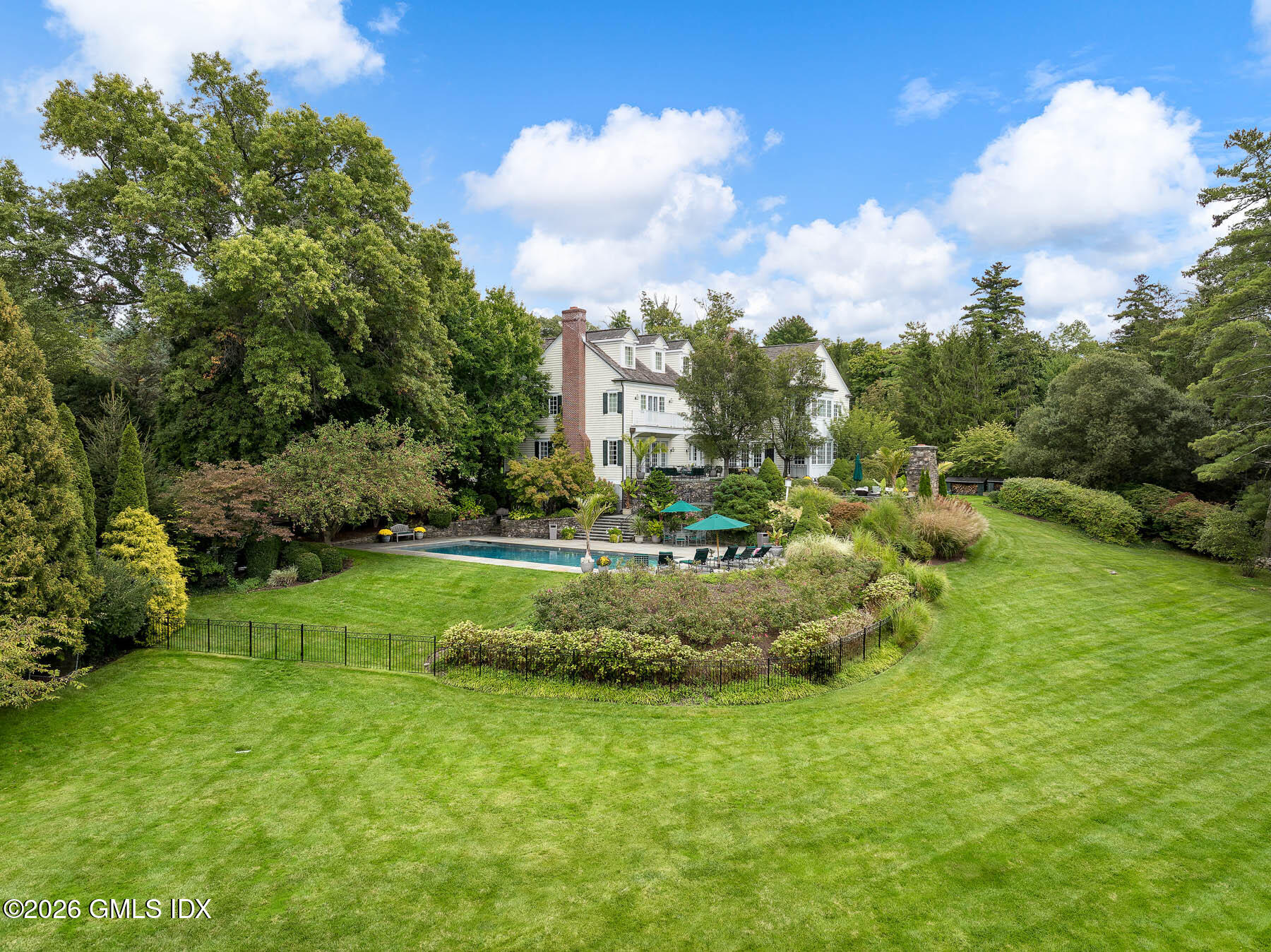 174 Round Hill Road Greenwich, CT 06831 - Photo 1 of 27 a view of a garden