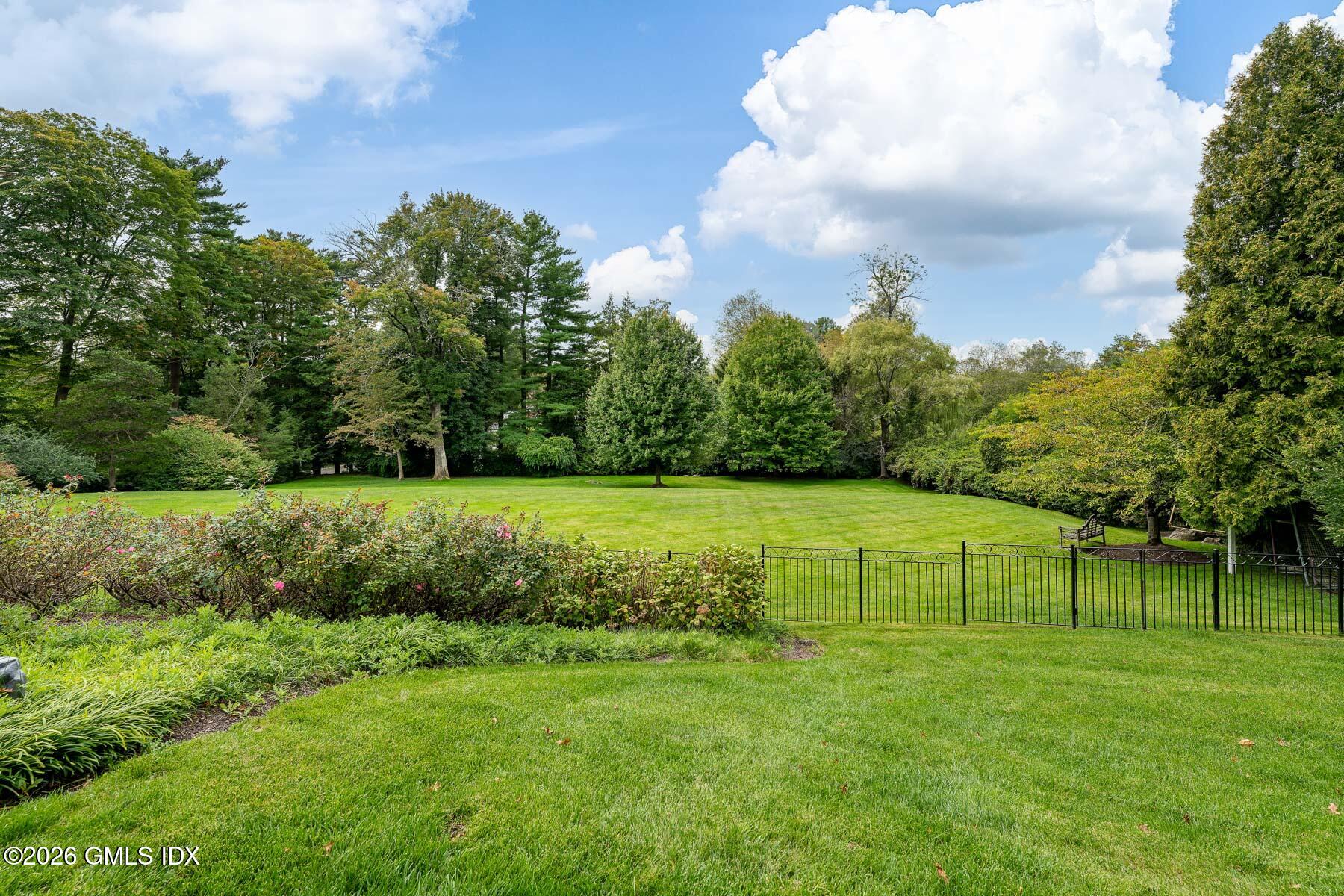174 Round Hill Road Greenwich, CT 06831 - Photo 2 of 27 a view of an outdoor space and a yard