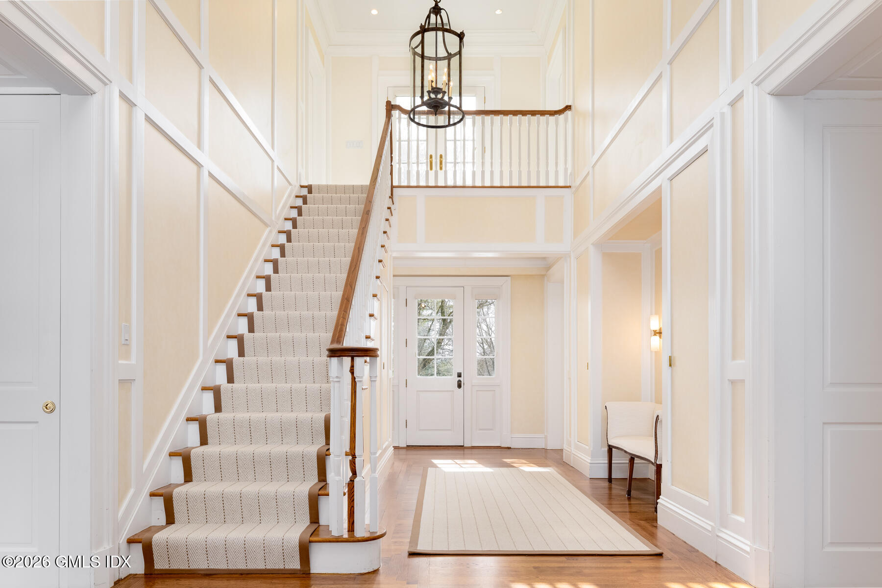 174 Round Hill Road Greenwich, CT 06831 - Photo 6 of 27 a view of an entryway with wooden floor