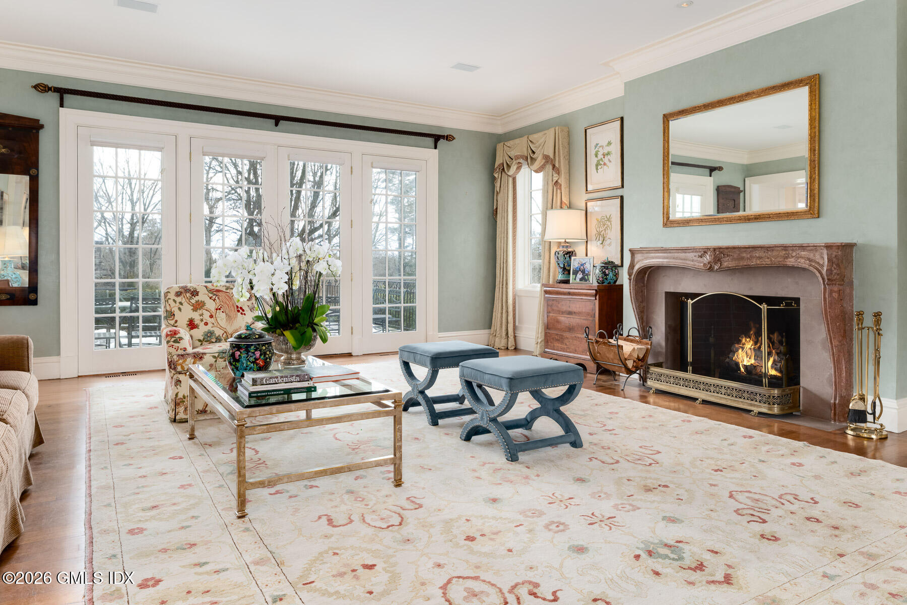 174 Round Hill Road Greenwich, CT 06831 - Photo 7 of 27 a living room with furniture and a fireplace