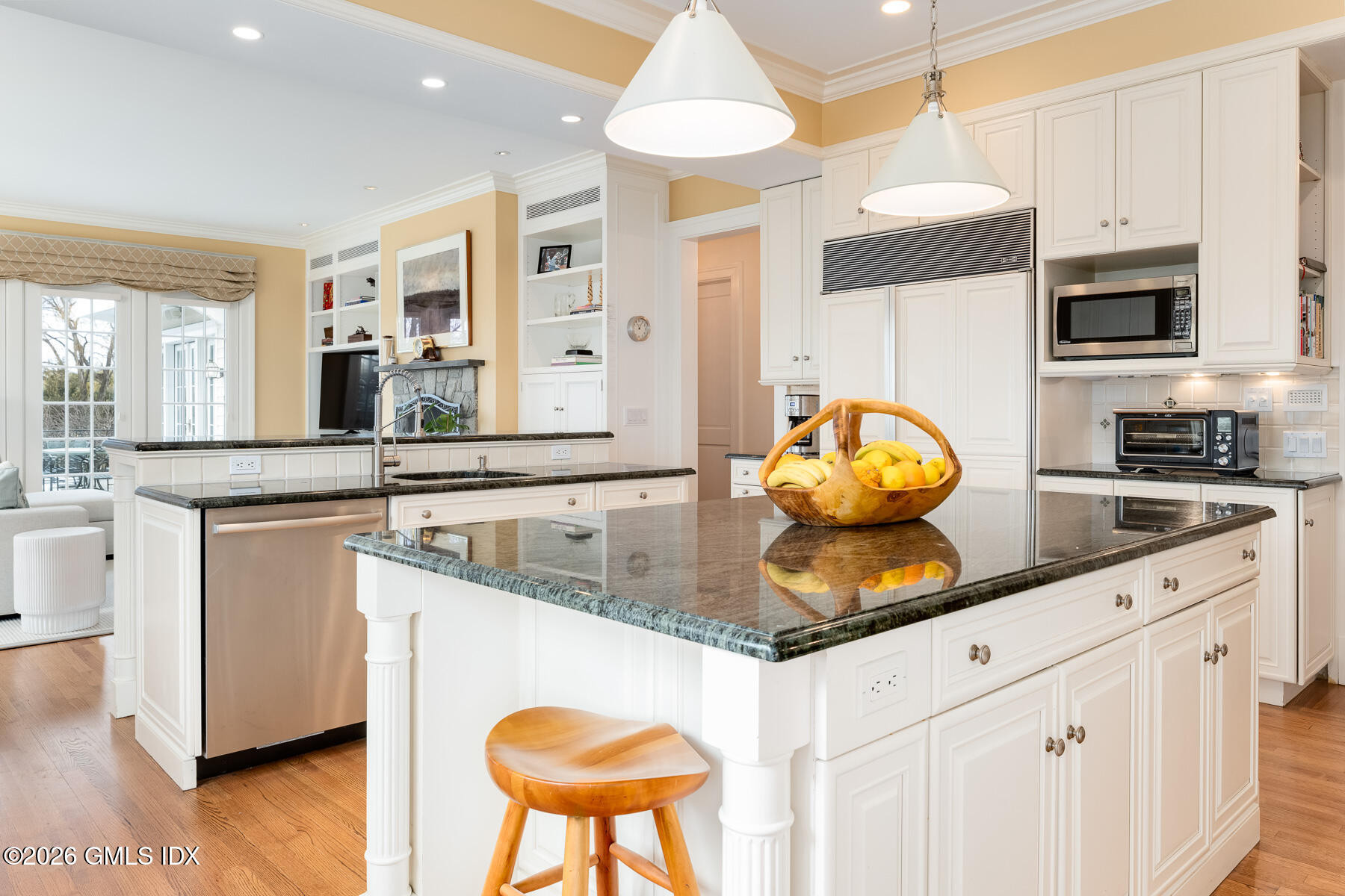 174 Round Hill Road Greenwich, CT 06831 - Photo 10 of 27 a kitchen with stainless steel appliances granite countertop a stove a sink and a microwave