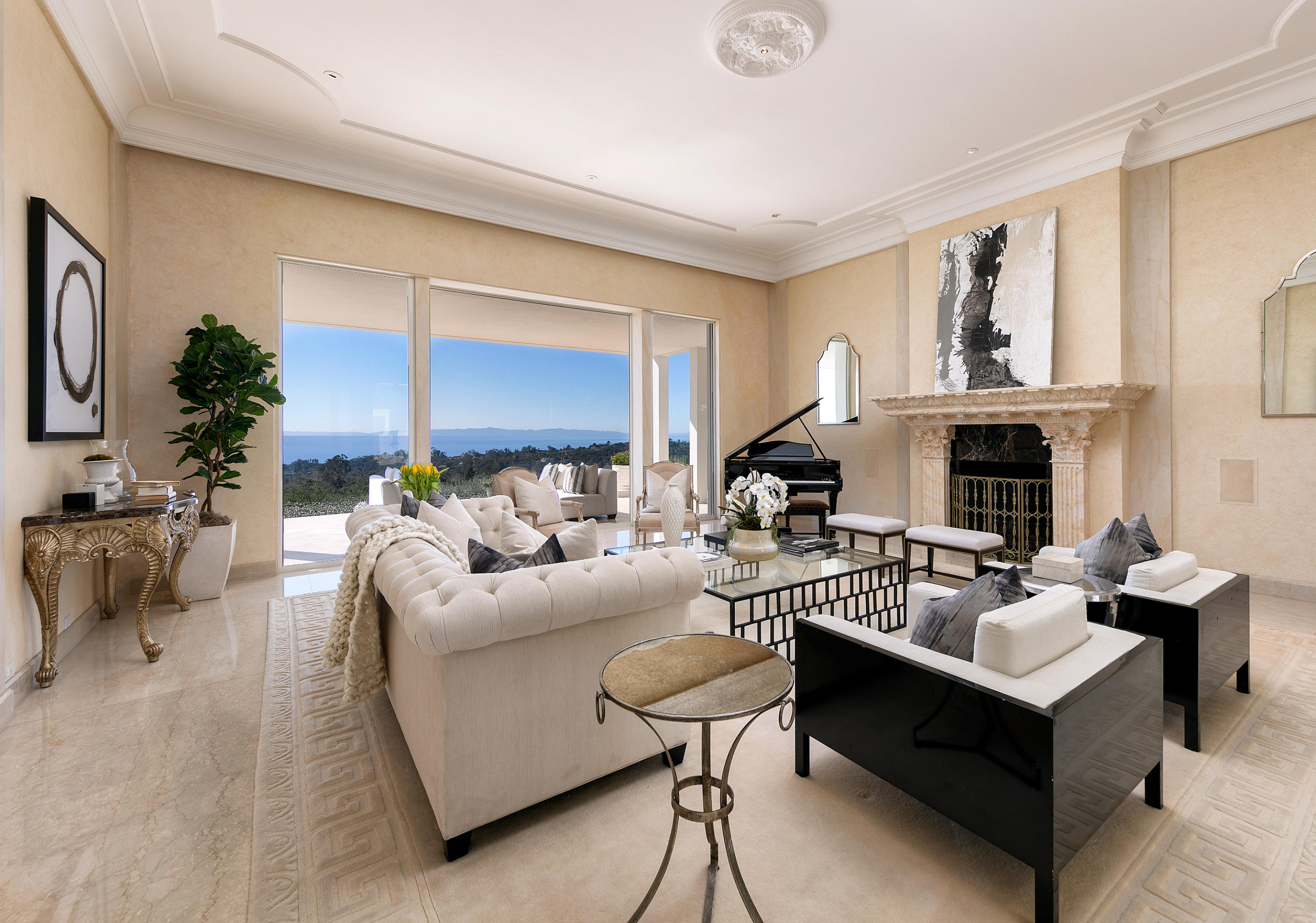 1188 East Mountain Drive Montecito, CA 93108 - Photo 12 of 44 a living room with furniture fireplace and a large window