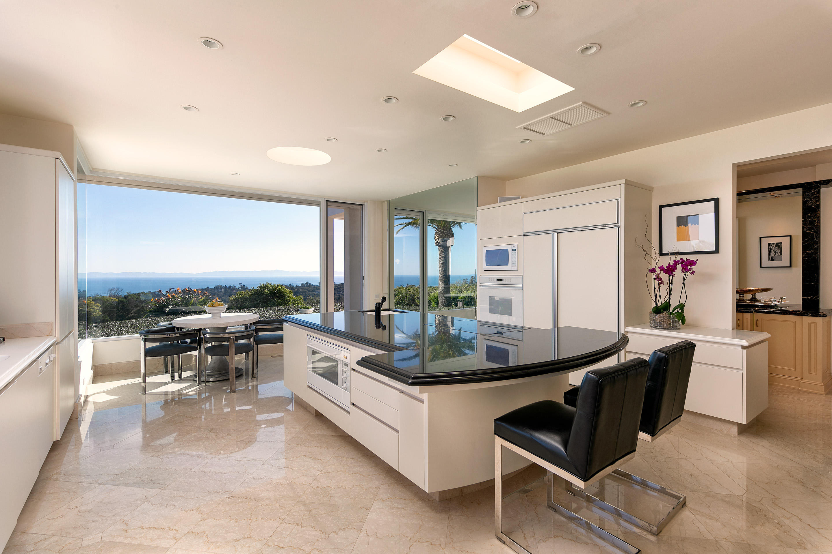 1188 East Mountain Drive Montecito, CA 93108 - Photo 21 of 44 a living room with furniture and a large window