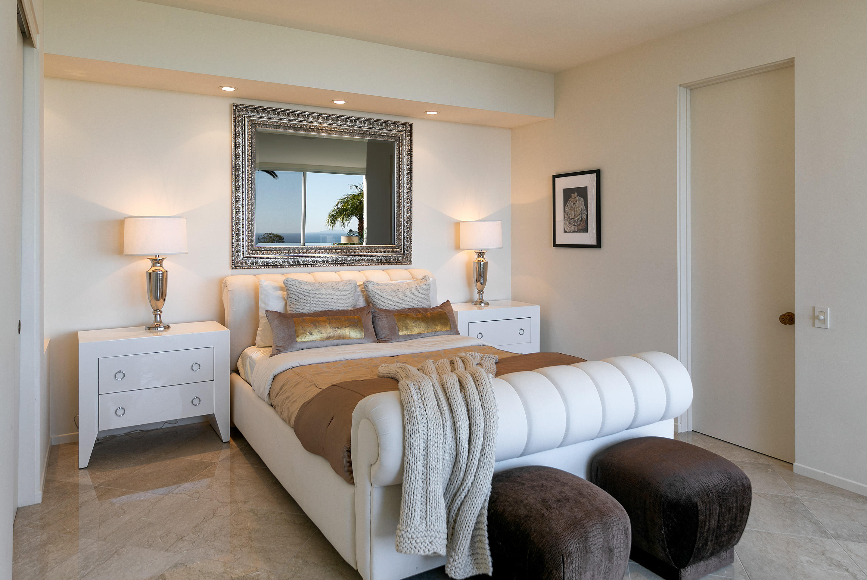 1188 East Mountain Drive Montecito, CA 93108 - Photo 32 of 44 a bedroom with a bed and lamp