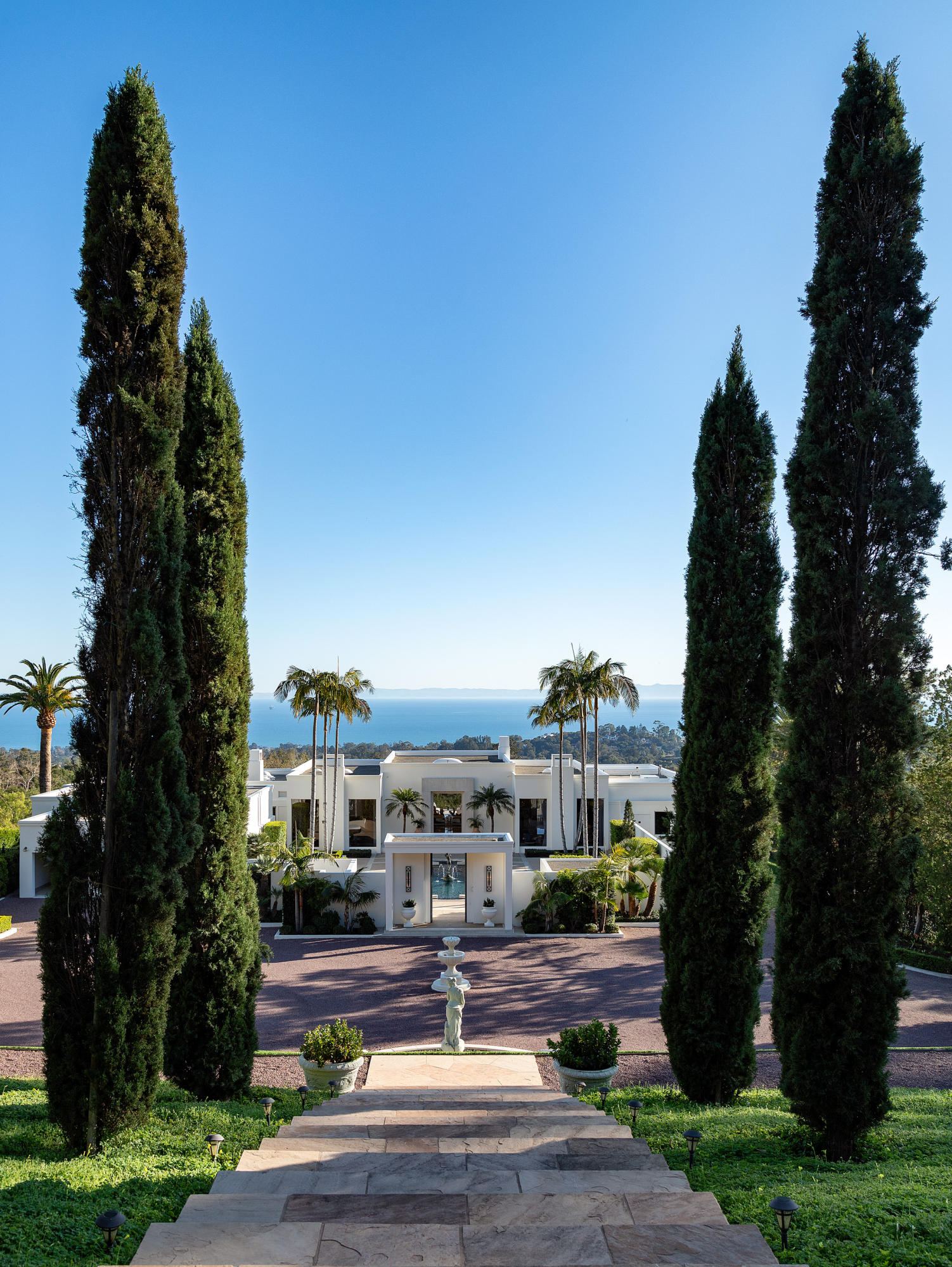 1188 East Mountain Drive Montecito, CA 93108 - Photo 42 of 44 a front view of a house with a garden