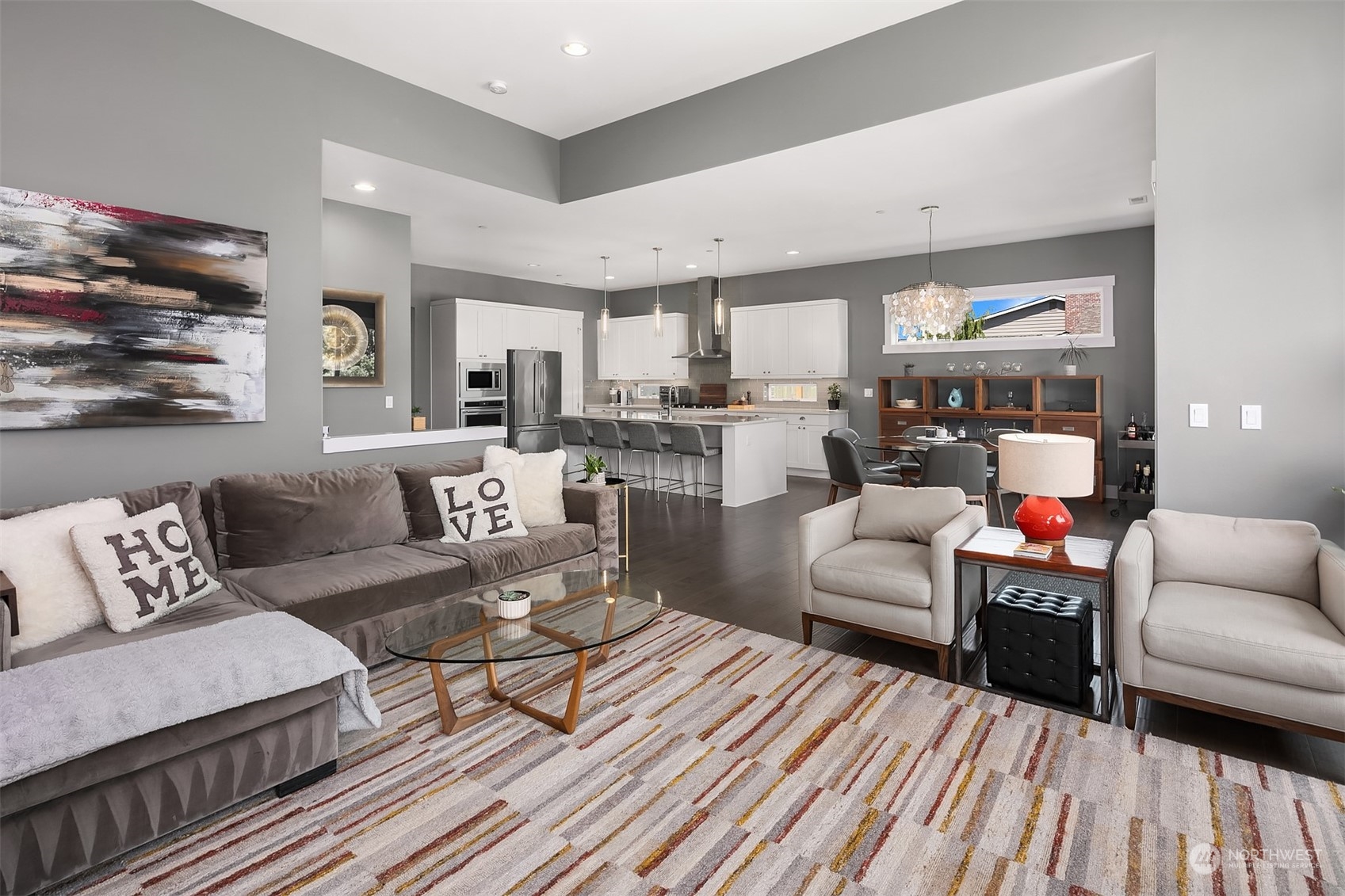 8721 218th Street Southwest Edmonds, WA 98026 - Photo 14 of 34 a living room with furniture and a large window