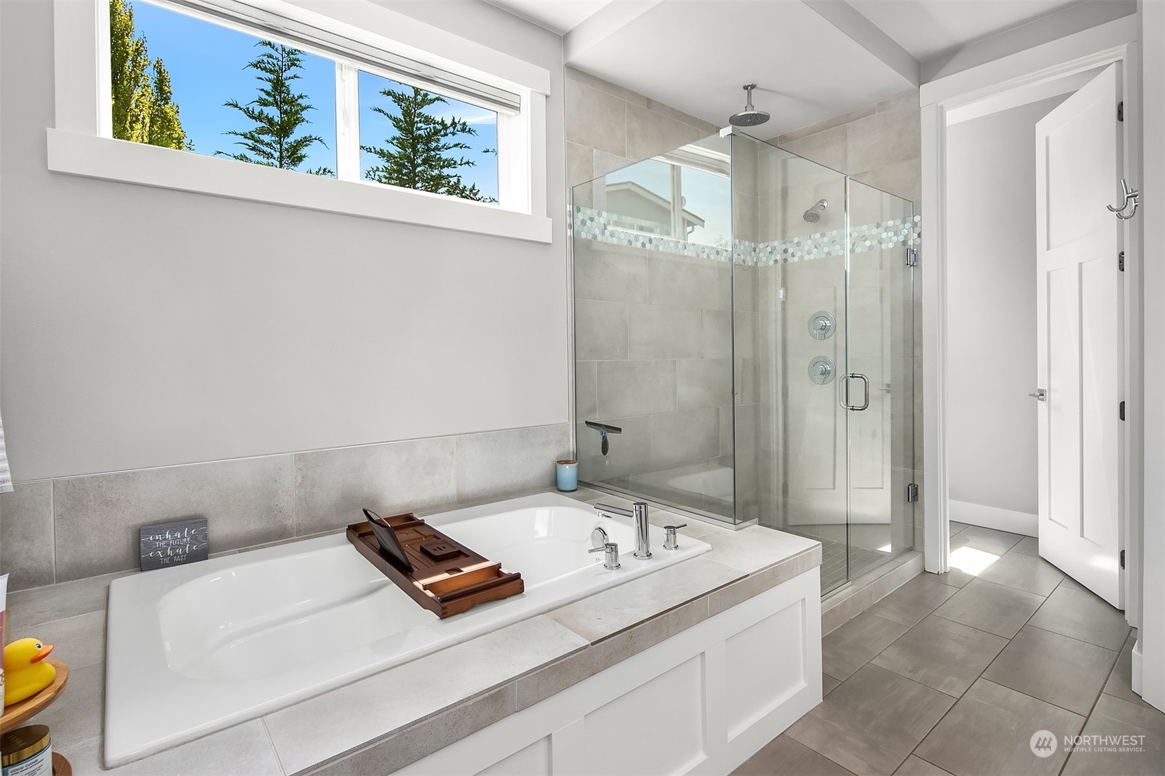 8721 218th Street Southwest Edmonds, WA 98026 - Photo 20 of 34 a bathroom with a tub sink and shower
