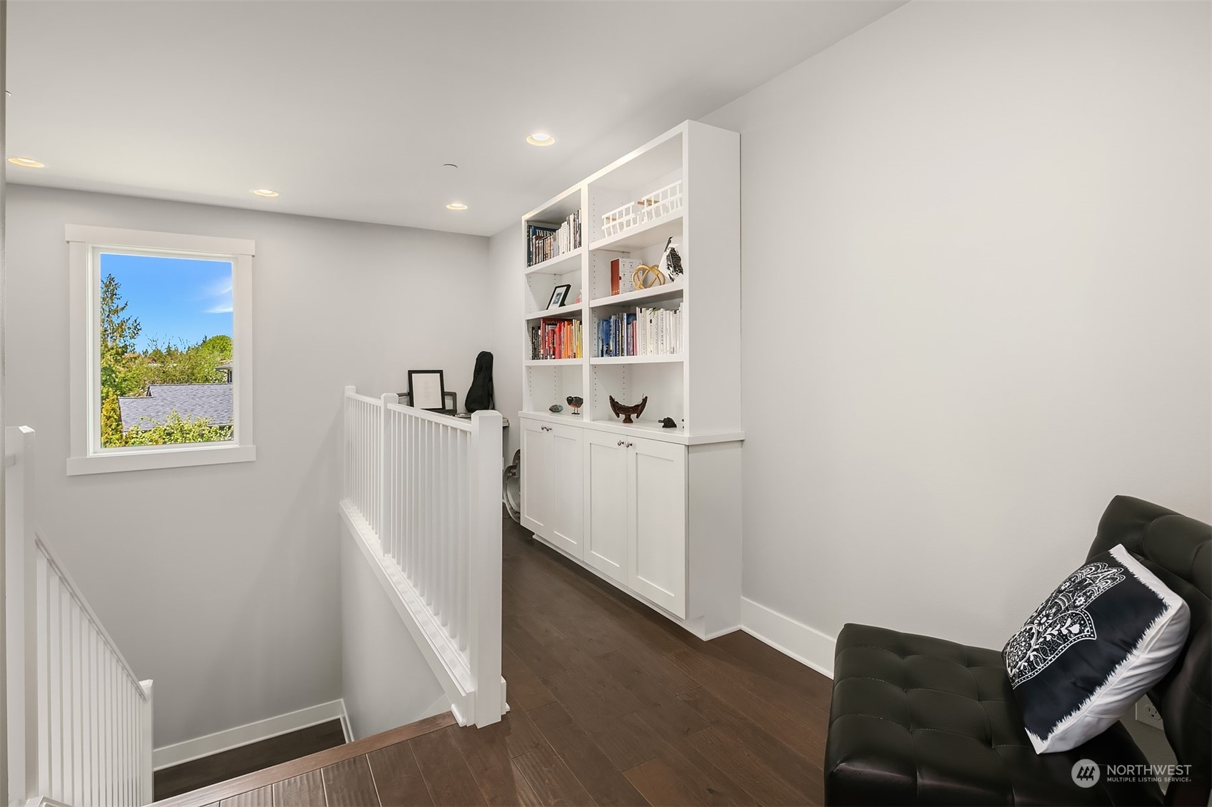 8721 218th Street Southwest Edmonds, WA 98026 - Photo 22 of 34 a view of a hallway with workspace and wooden floor