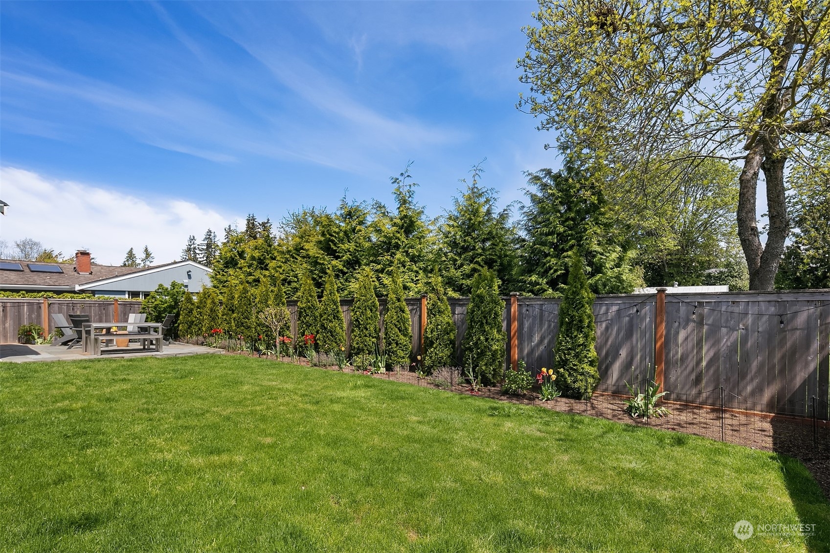 8721 218th Street Southwest Edmonds, WA 98026 - Photo 30 of 34 a view of a house with backyard and a tree