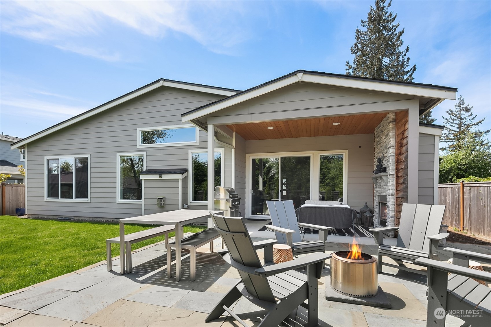 8721 218th Street Southwest Edmonds, WA 98026 - Photo 31 of 34 a view of a house with a yard and sitting area