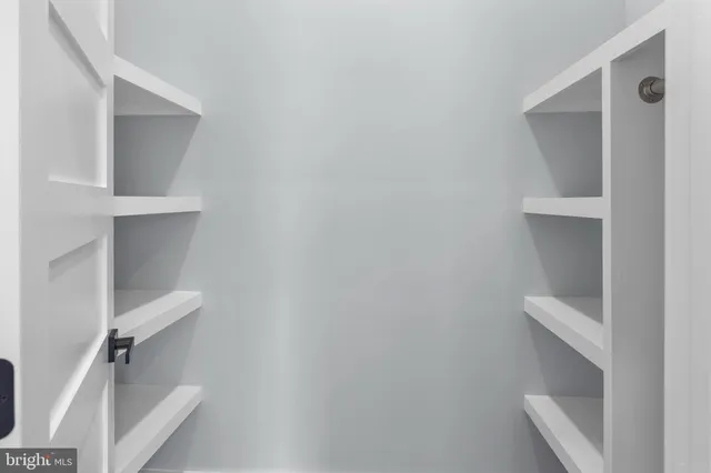 a view of small space with racks on the wall