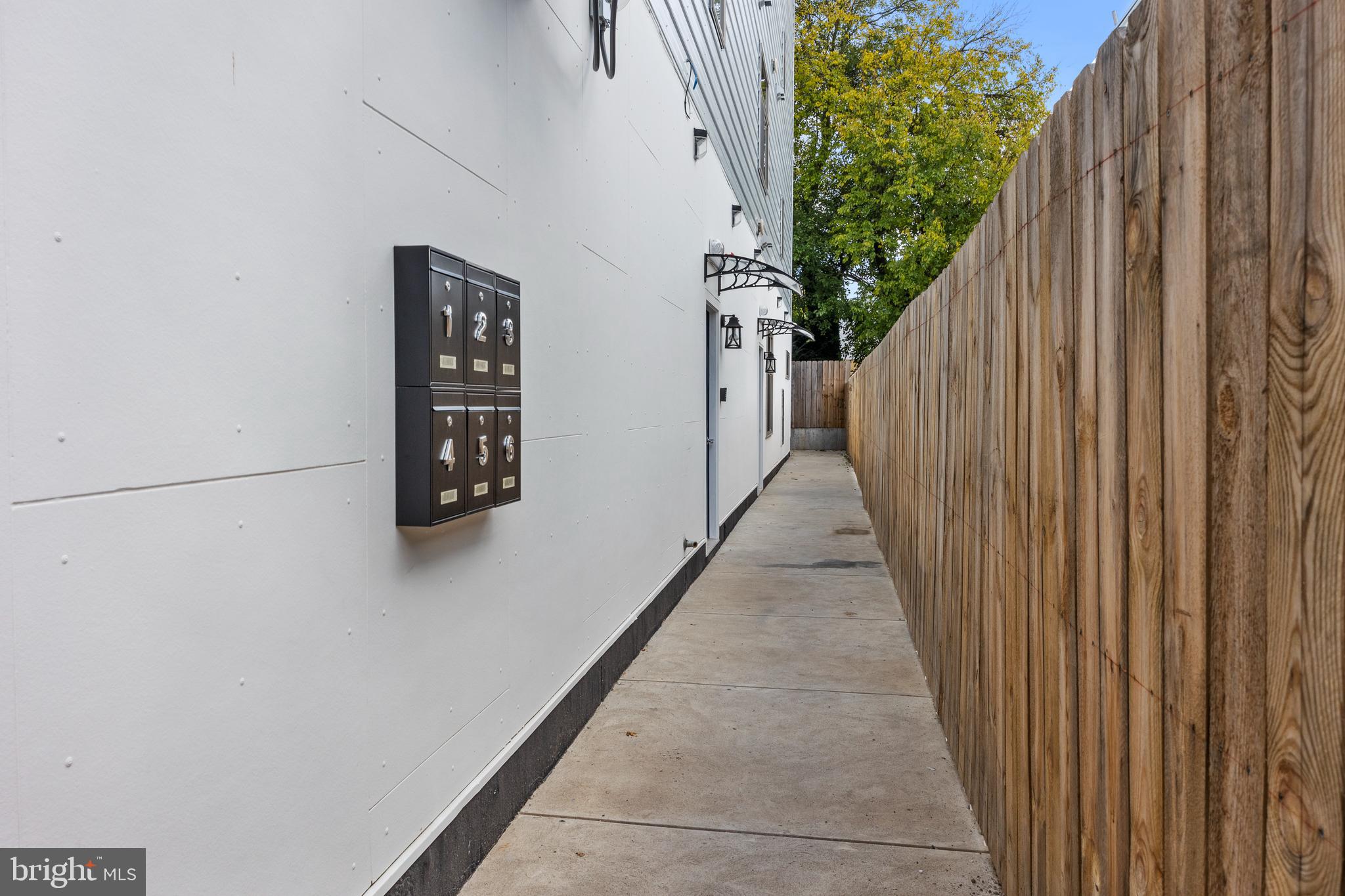 342 West Queen Lane, Unit 5 Philadelphia, PA 19144 - Photo 4 of 18 a view of a pathway of a wooden building