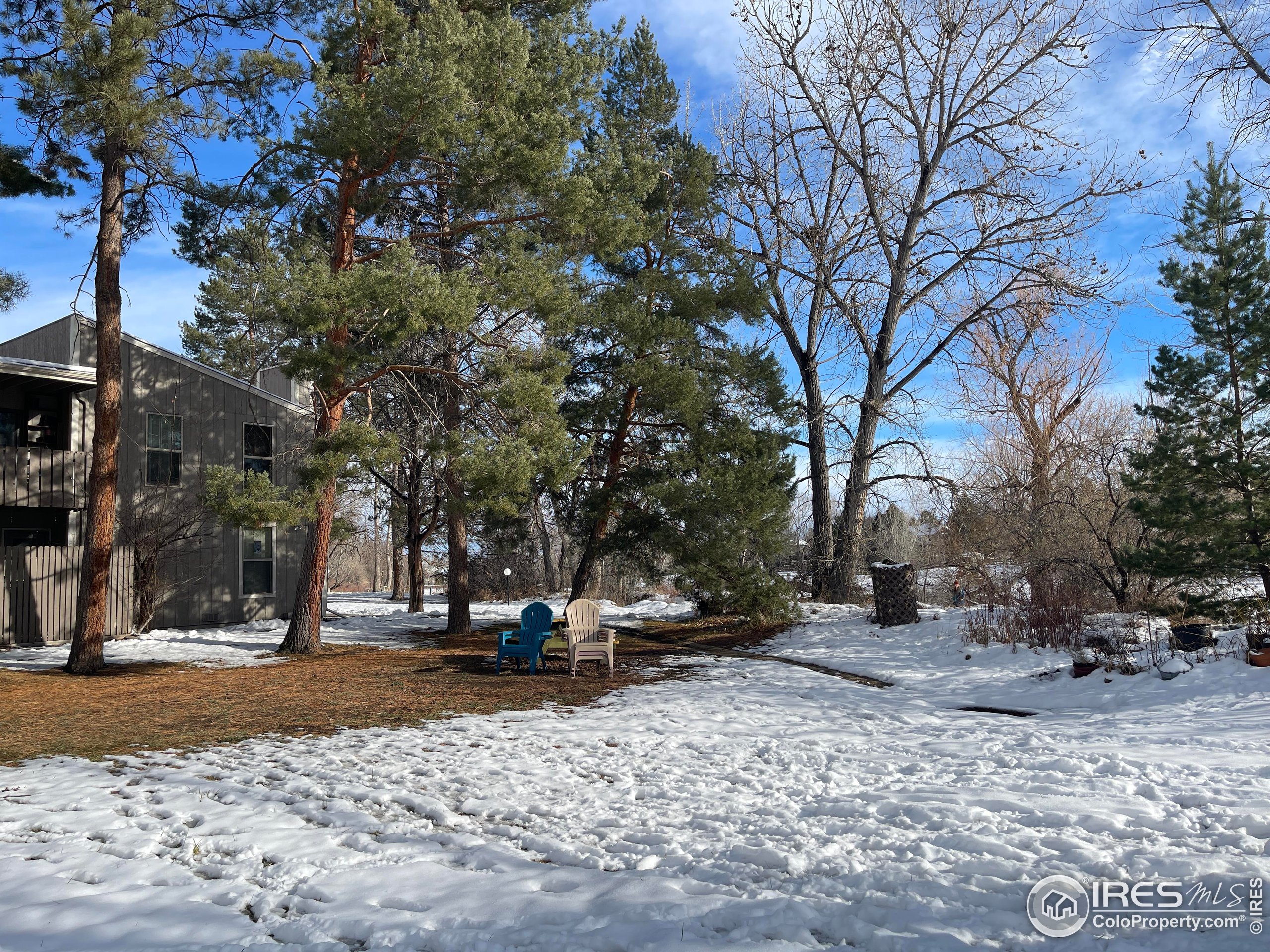 8060 Niwot Road, Unit 66 Niwot, CO 80503 - Photo 12 of 17 a view of a park with bench on the roadside