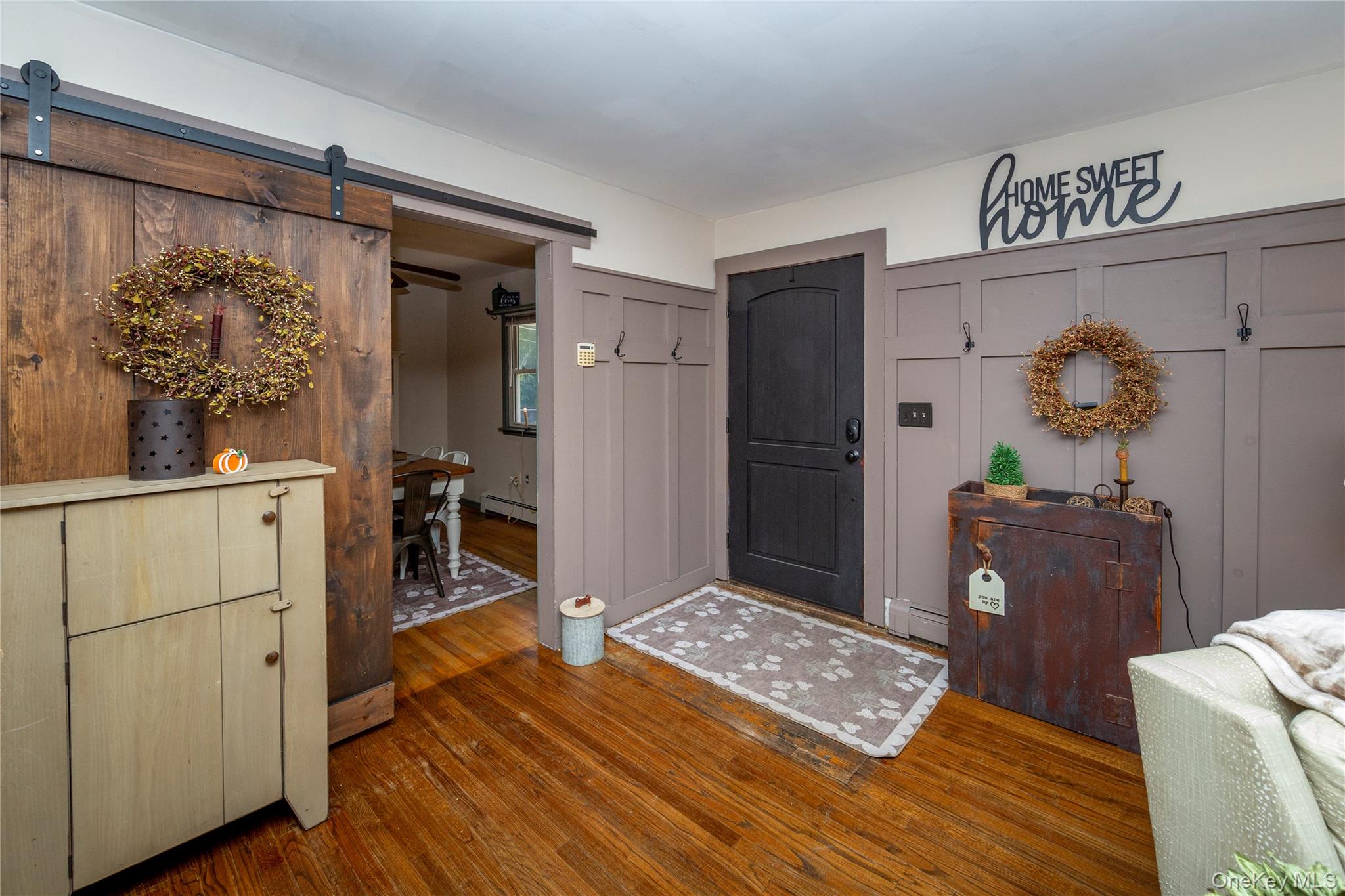 39 Birch Hill Road Patterson, NY 12563 - Photo 4 of 44 Inside, the spacious living room greets you with hardwood floors.