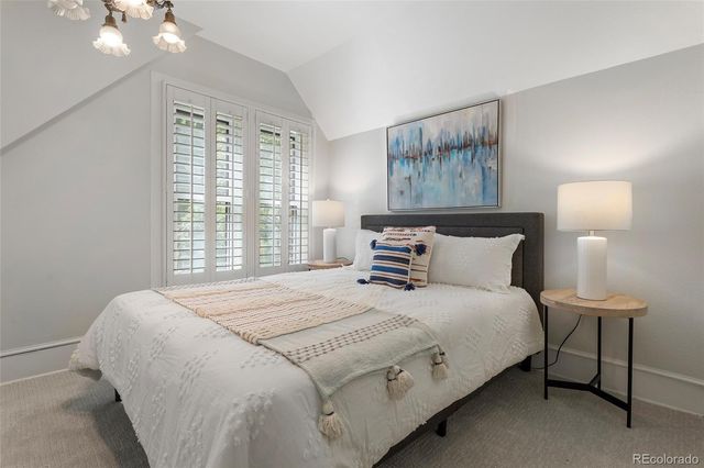 a bathroom with a shower a toilet and a tub