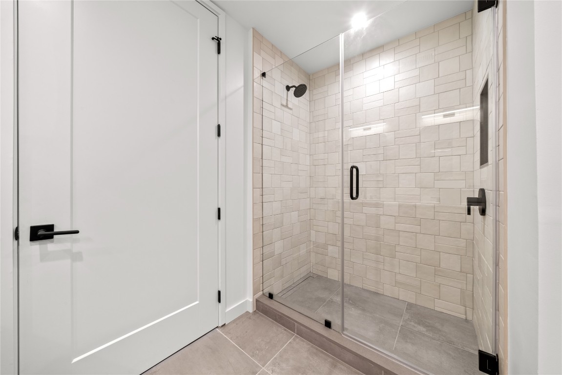 84 East Avenue, Unit 2403 Austin, TX 78701 - Photo 8 of 29 Repreentative Photo. Primary Bathroom with Frameless Mud set Walk in Shower.