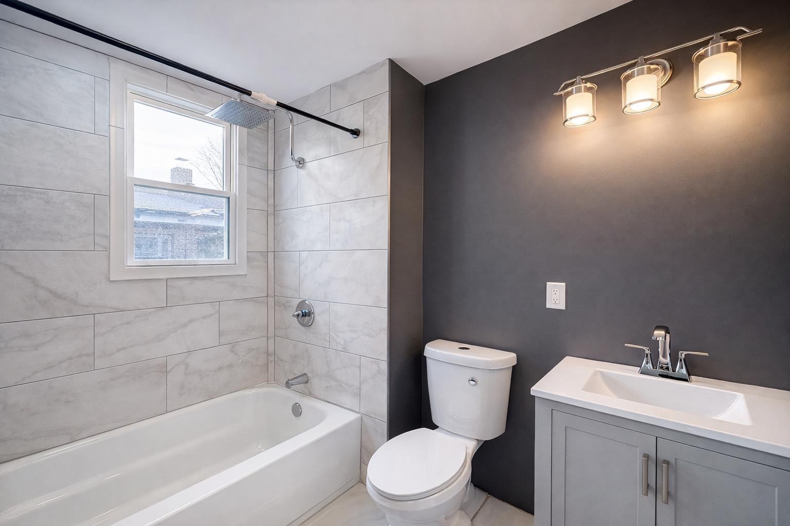 1572 Summit Avenue, Unit 2 Hillside, NJ 07205 - Photo 13 of 20 a bathroom with a toilet a sink and bathtub