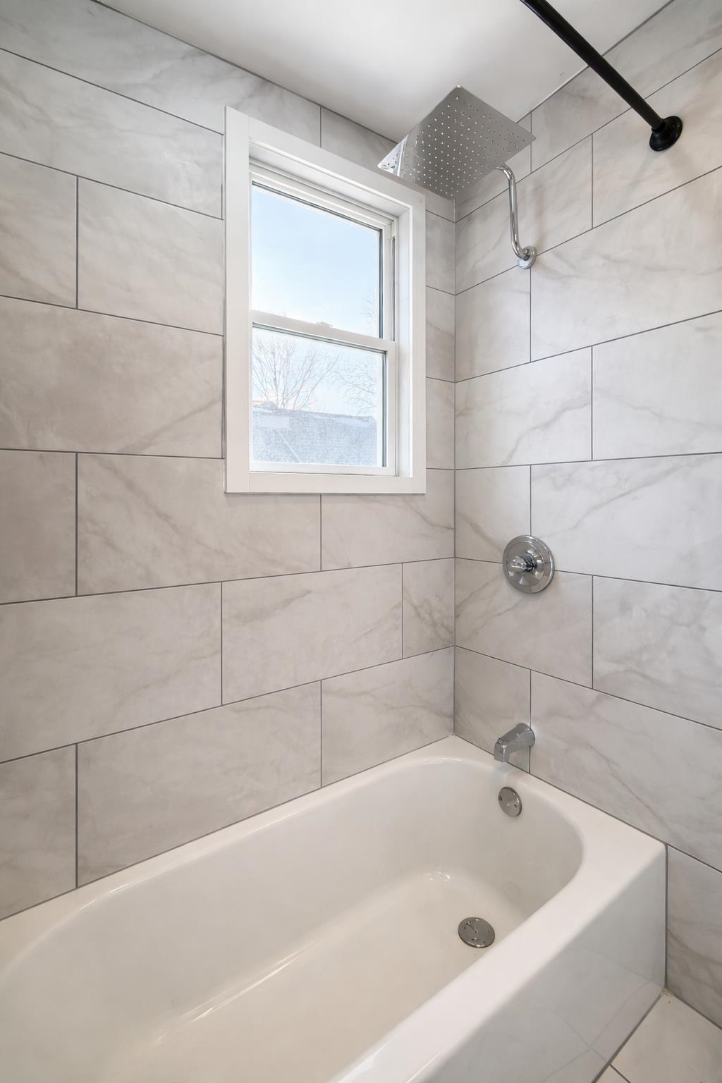 1572 Summit Avenue, Unit 2 Hillside, NJ 07205 - Photo 15 of 20 a white bath tub and a shower