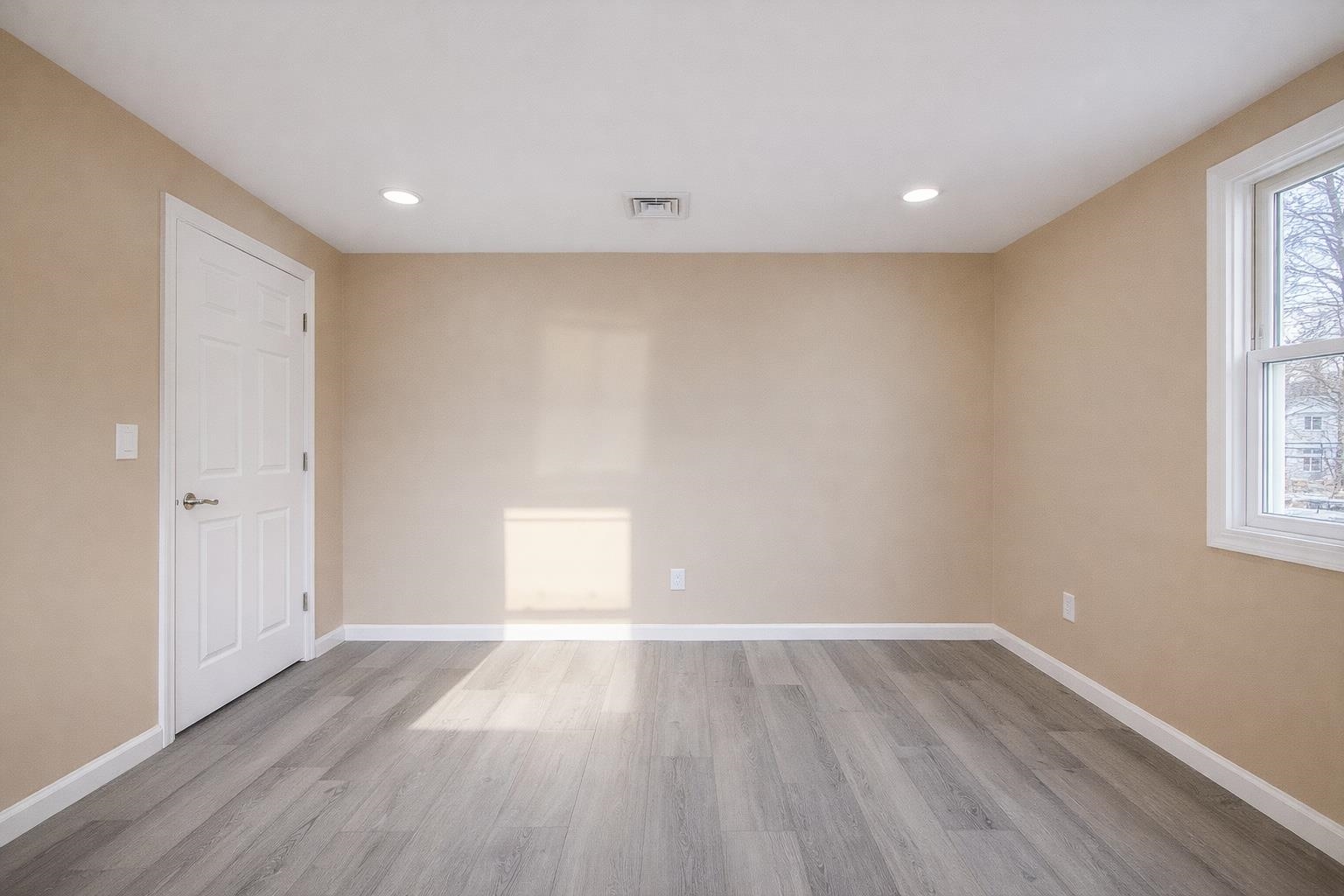 1572 Summit Avenue, Unit 2 Hillside, NJ 07205 - Photo 18 of 20 wooden floor in an empty room with a window