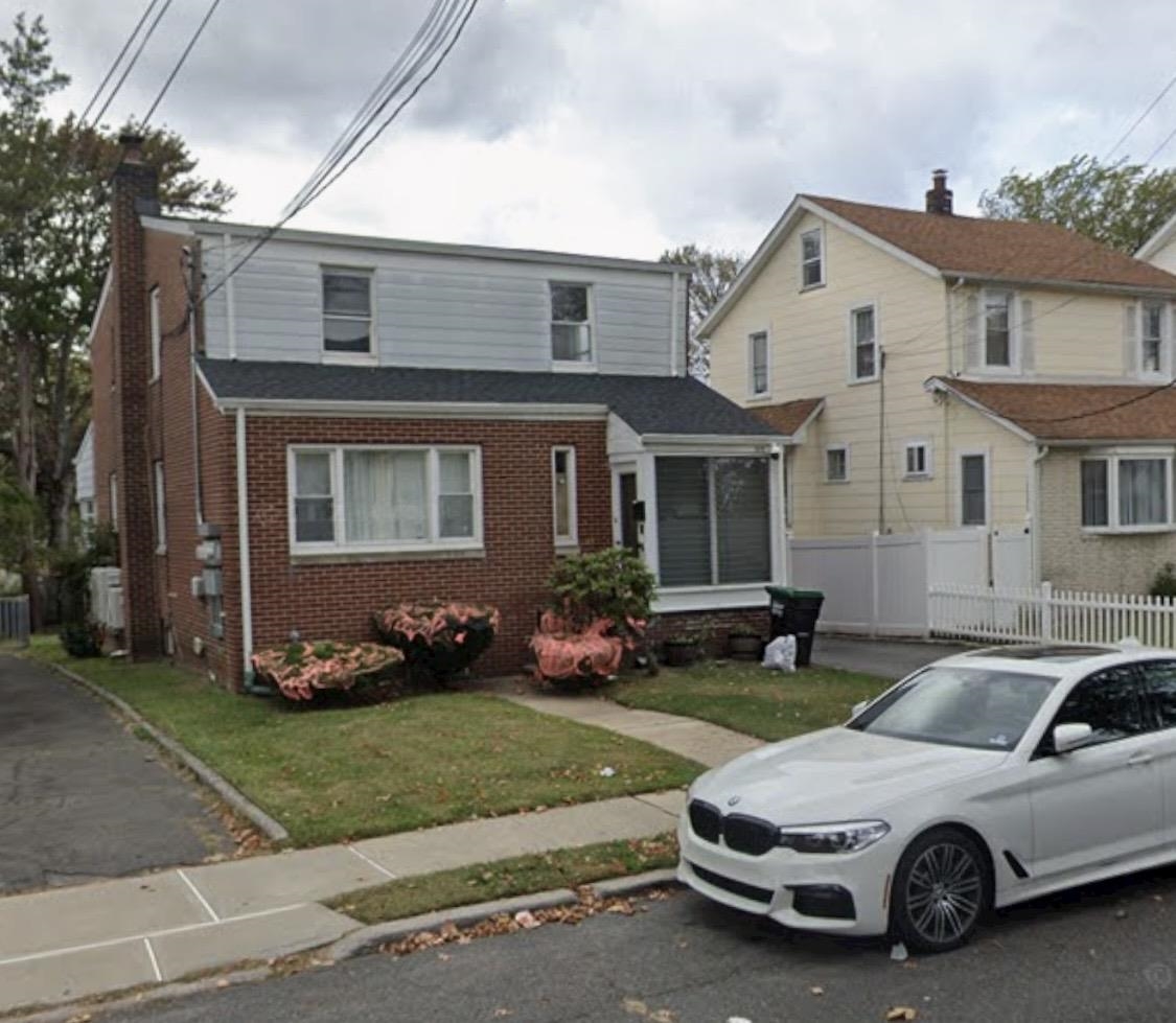 1572 Summit Avenue, Unit 2 Hillside, NJ 07205 - Photo 19 of 20 a car parked in front of a house