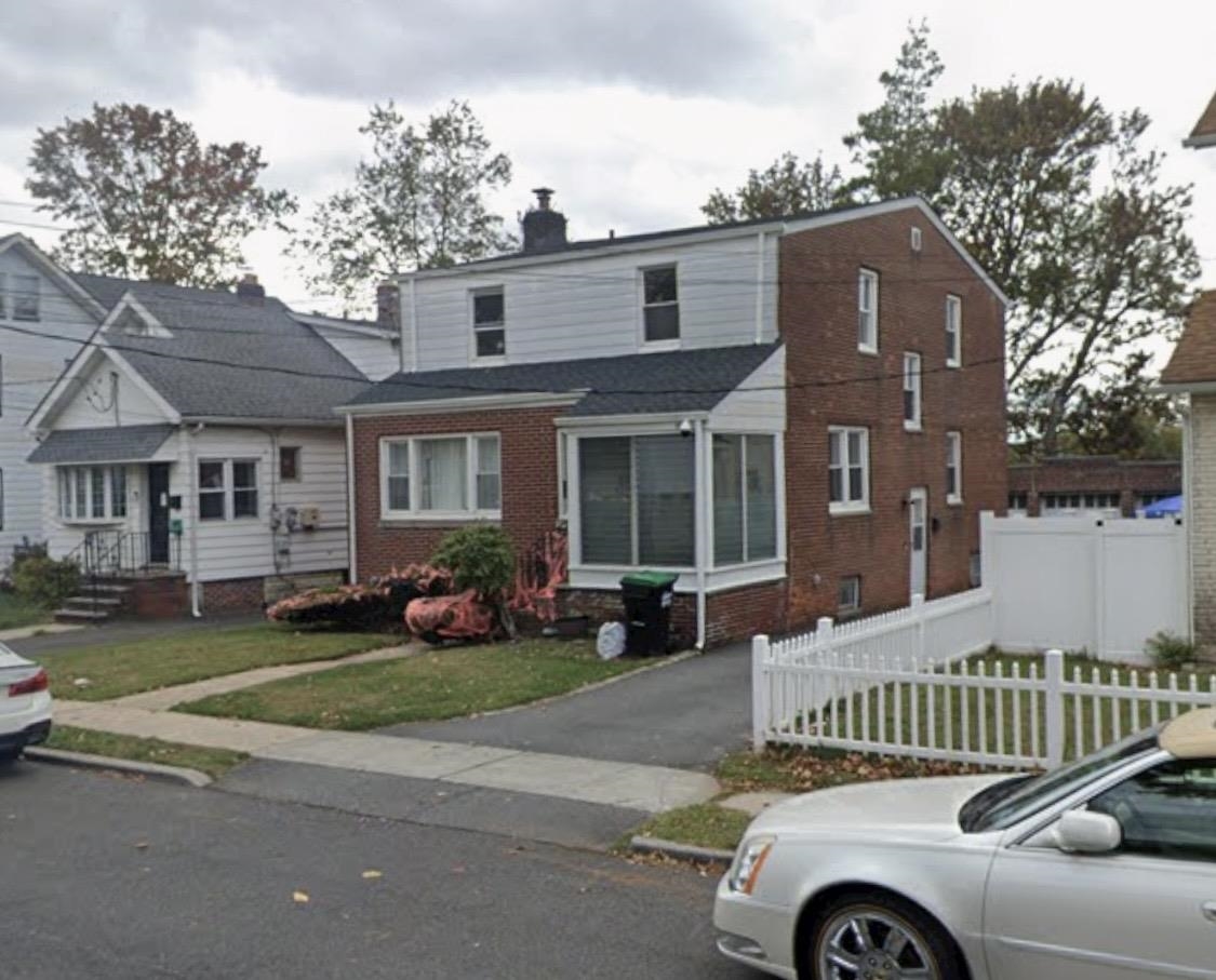1572 Summit Avenue, Unit 2 Hillside, NJ 07205 - Photo 20 of 20 a house view with a sitting space and garden space