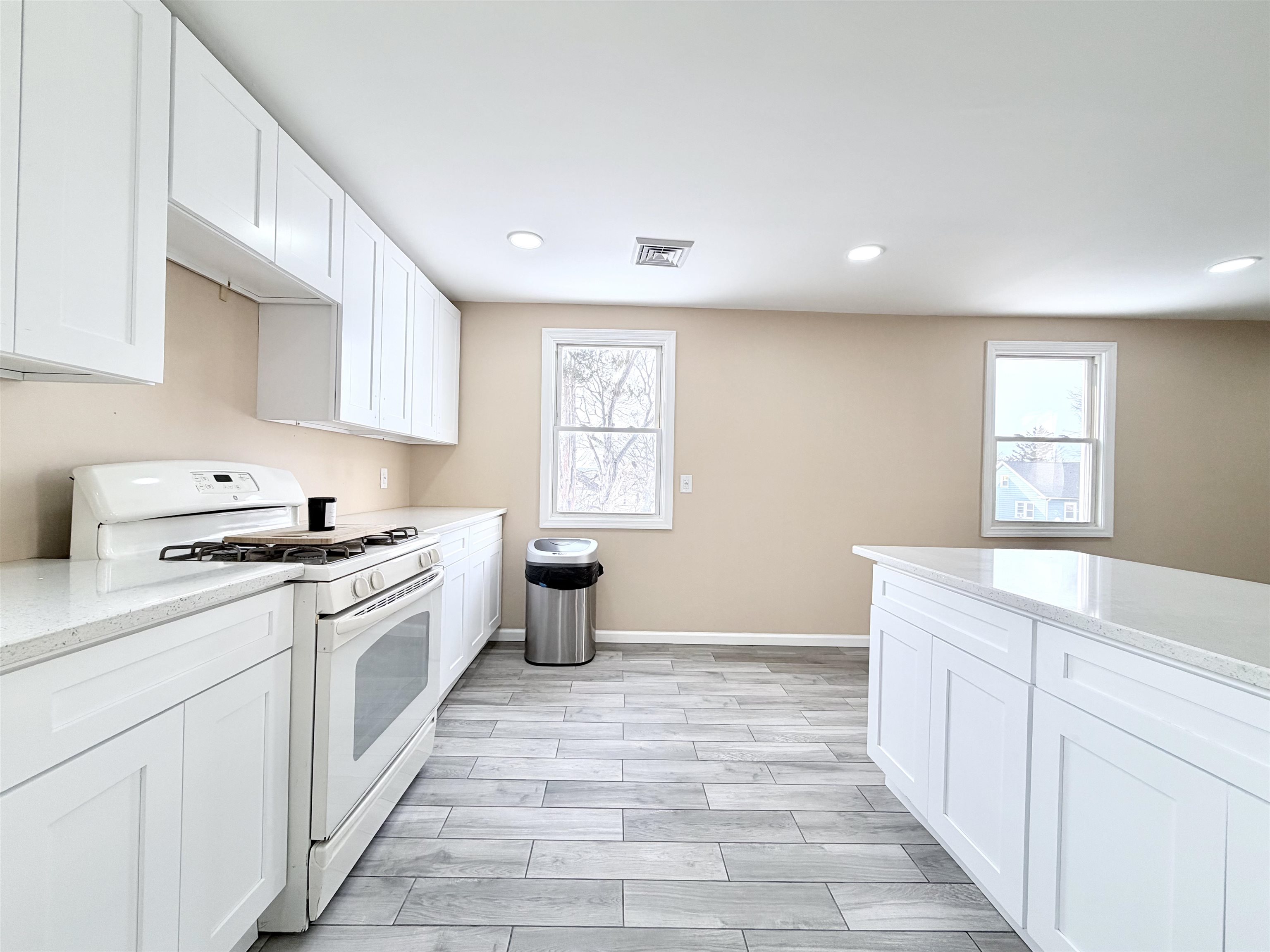 1572 Summit Avenue, Unit 2 Hillside, NJ 07205 - Photo 4 of 20 a kitchen with a stove sink and window