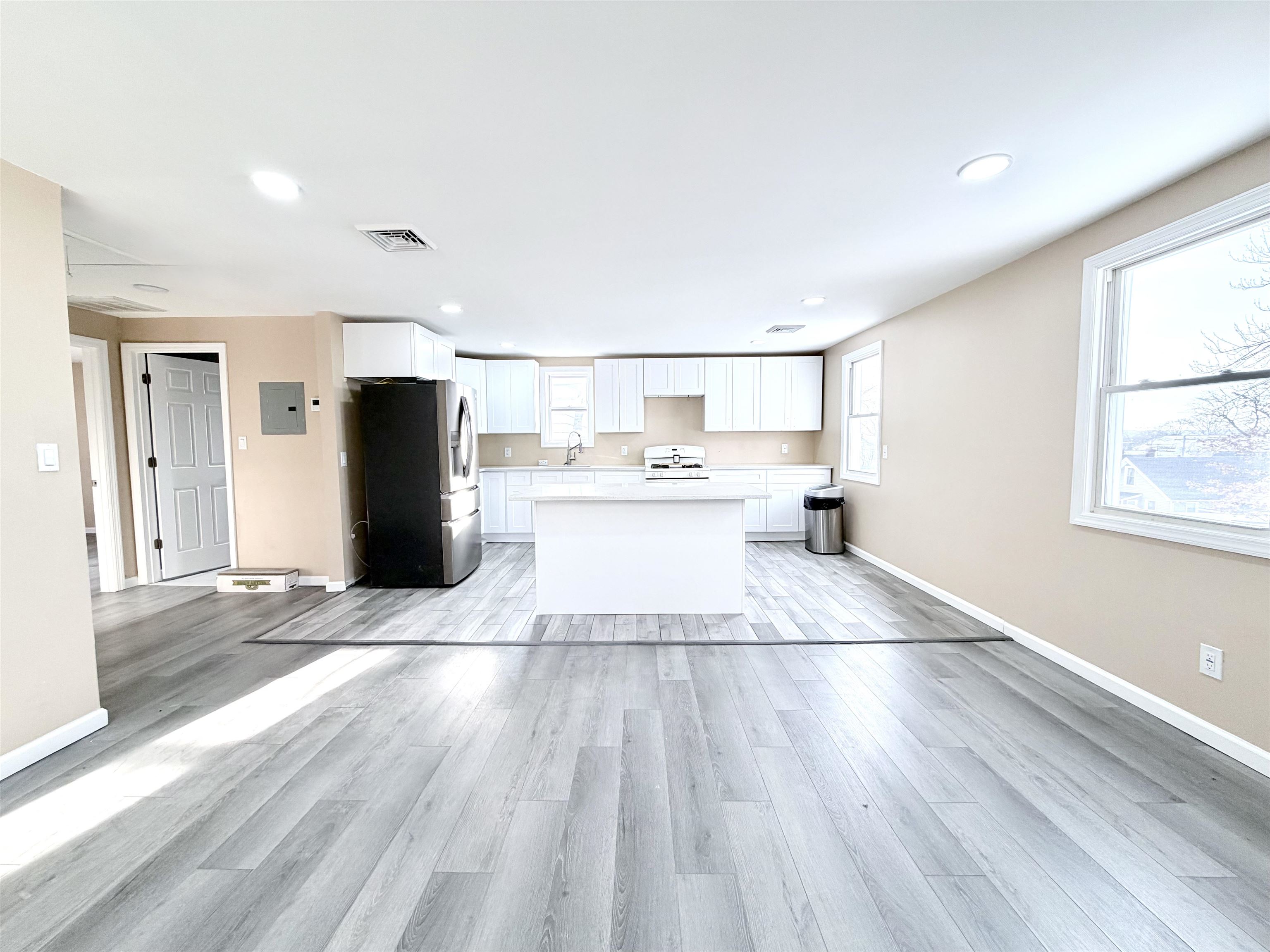1572 Summit Avenue, Unit 2 Hillside, NJ 07205 - Photo 6 of 20 a kitchen with stainless steel appliances granite countertop a refrigerator and a stove top oven