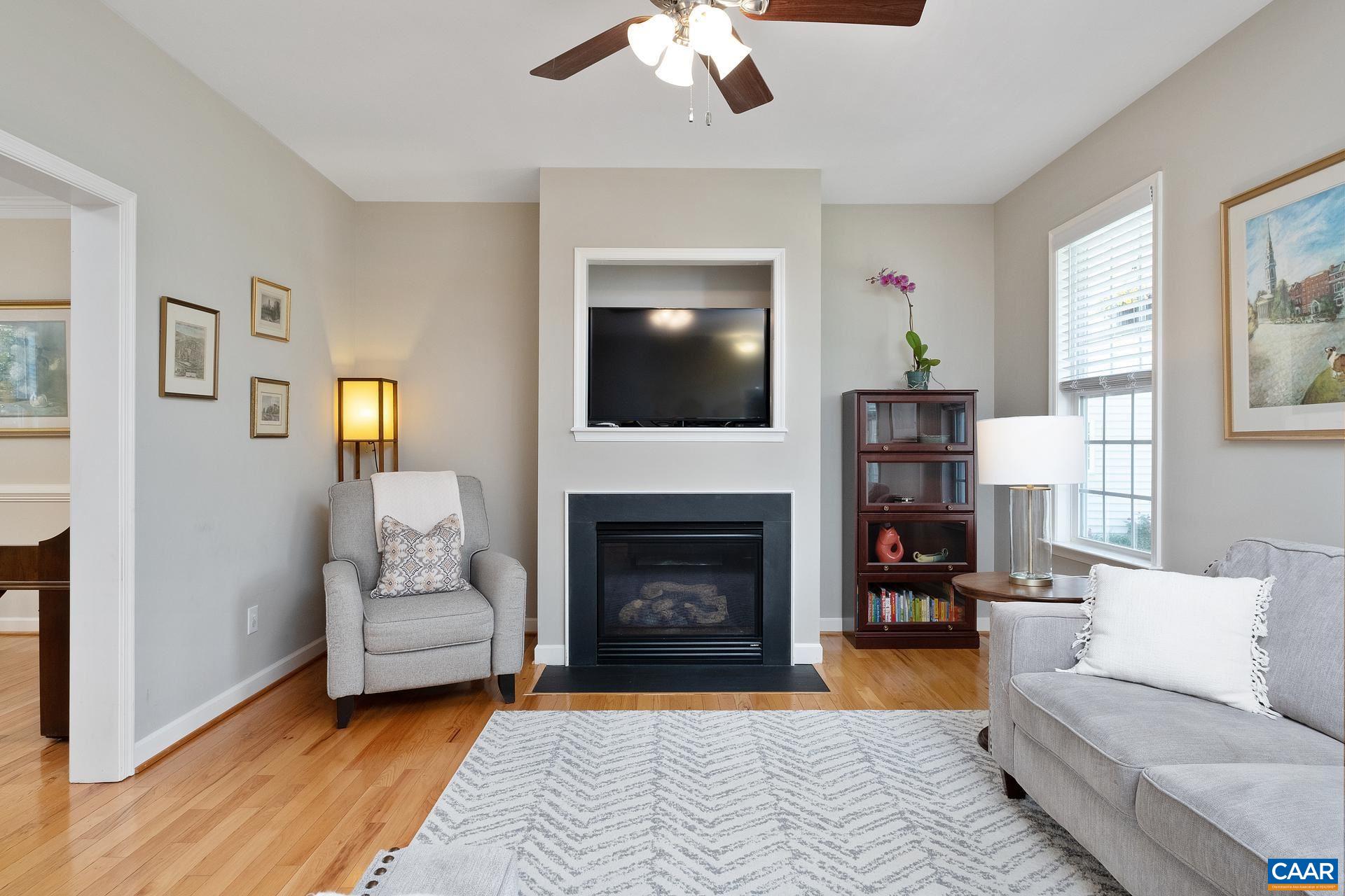 1285 Amber Ridge Road Crozet, VA 22901 - Photo 5 of 33 a living room with furniture and a fireplace
