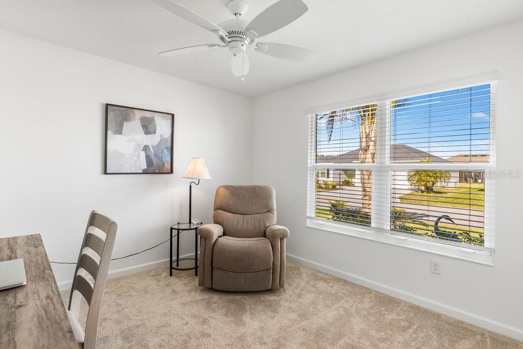 2938 Chimborazo Way The Villages, FL 32163 - Photo 13 of 50 a living room with furniture and a window