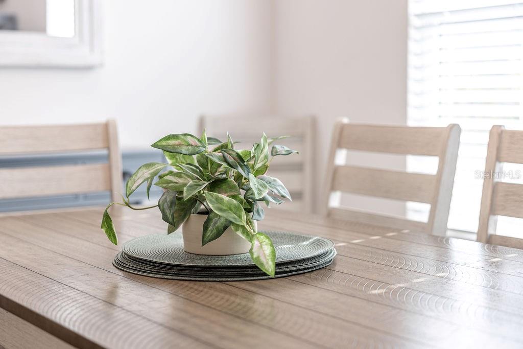 2938 Chimborazo Way The Villages, FL 32163 - Photo 16 of 50 a vase of flowers sitting on a table