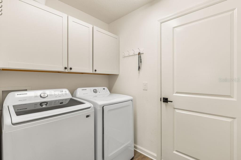 2938 Chimborazo Way The Villages, FL 32163 - Photo 33 of 50 a utility room with dryer and washer