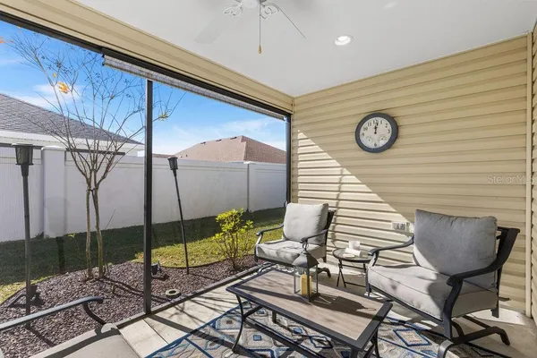 a view of a chairs and table in a room