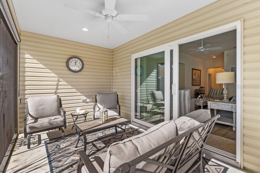 2938 Chimborazo Way The Villages, FL 32163 - Photo 35 of 50 a living room with furniture and a large window