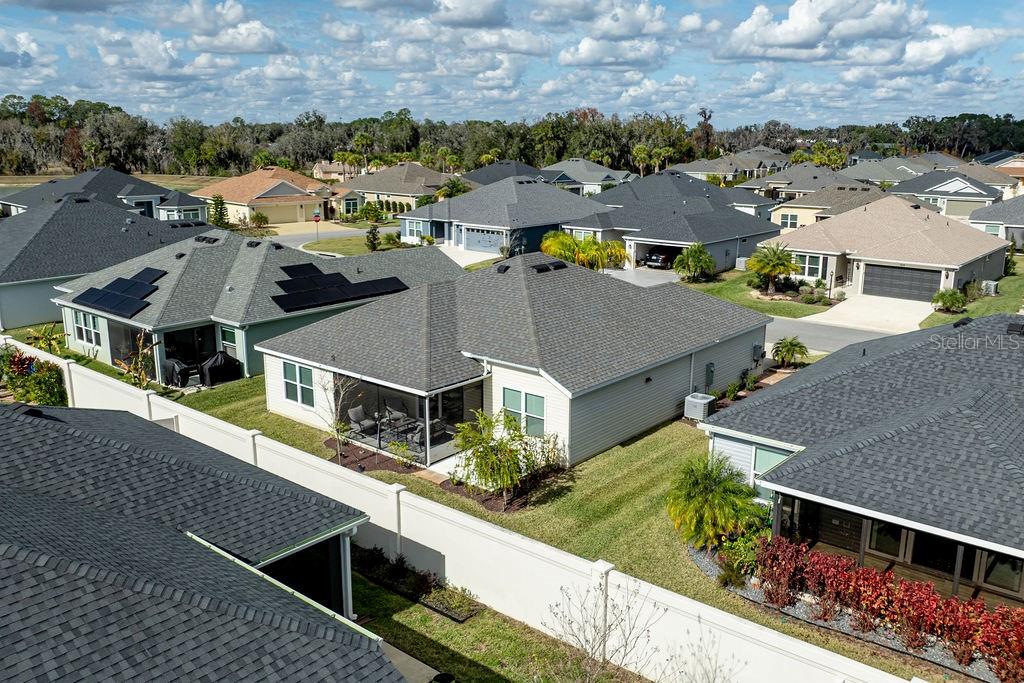 2938 Chimborazo Way The Villages, FL 32163 - Photo 47 of 50 an aerial view of residential houses with outdoor space