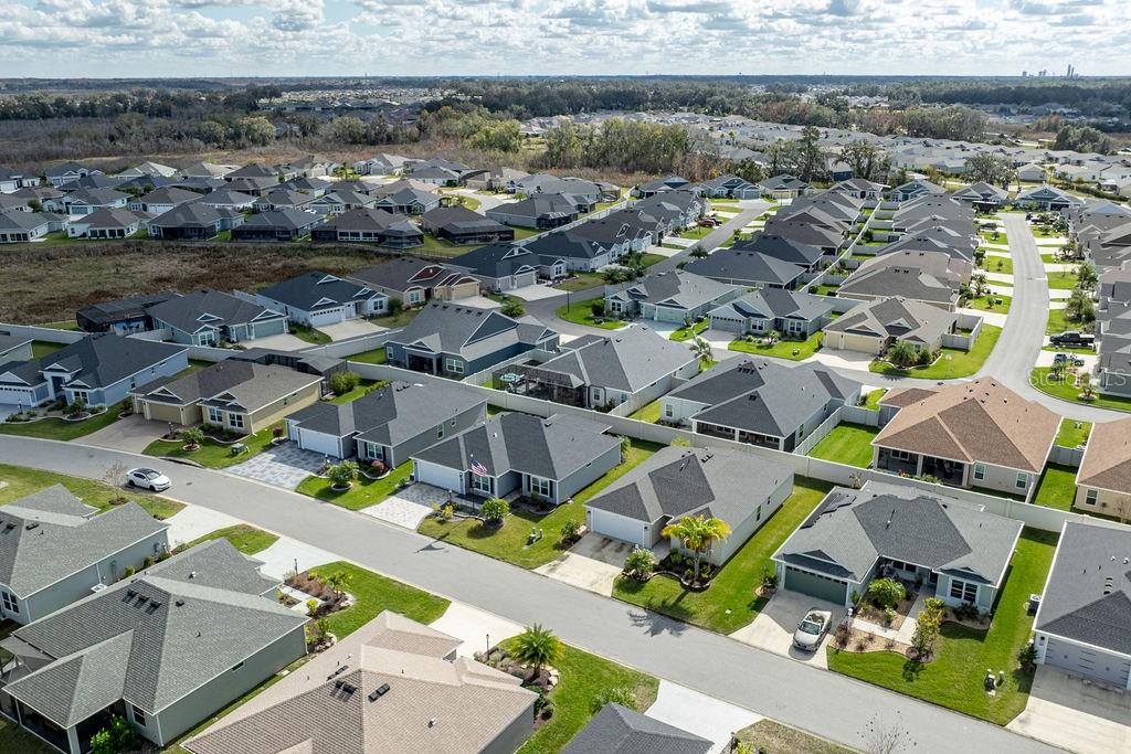 2938 Chimborazo Way The Villages, FL 32163 - Photo 49 of 50 an aerial view of residential houses with outdoor space
